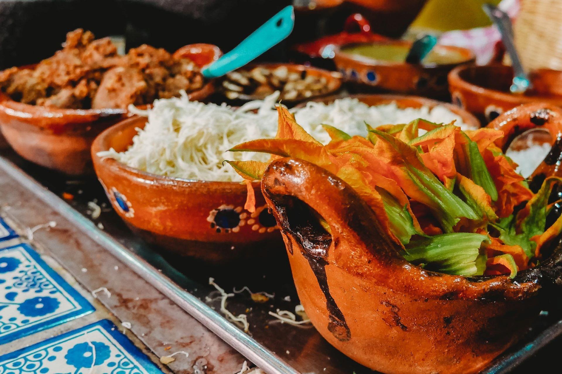 A selection of Mexican dishes on a platter.