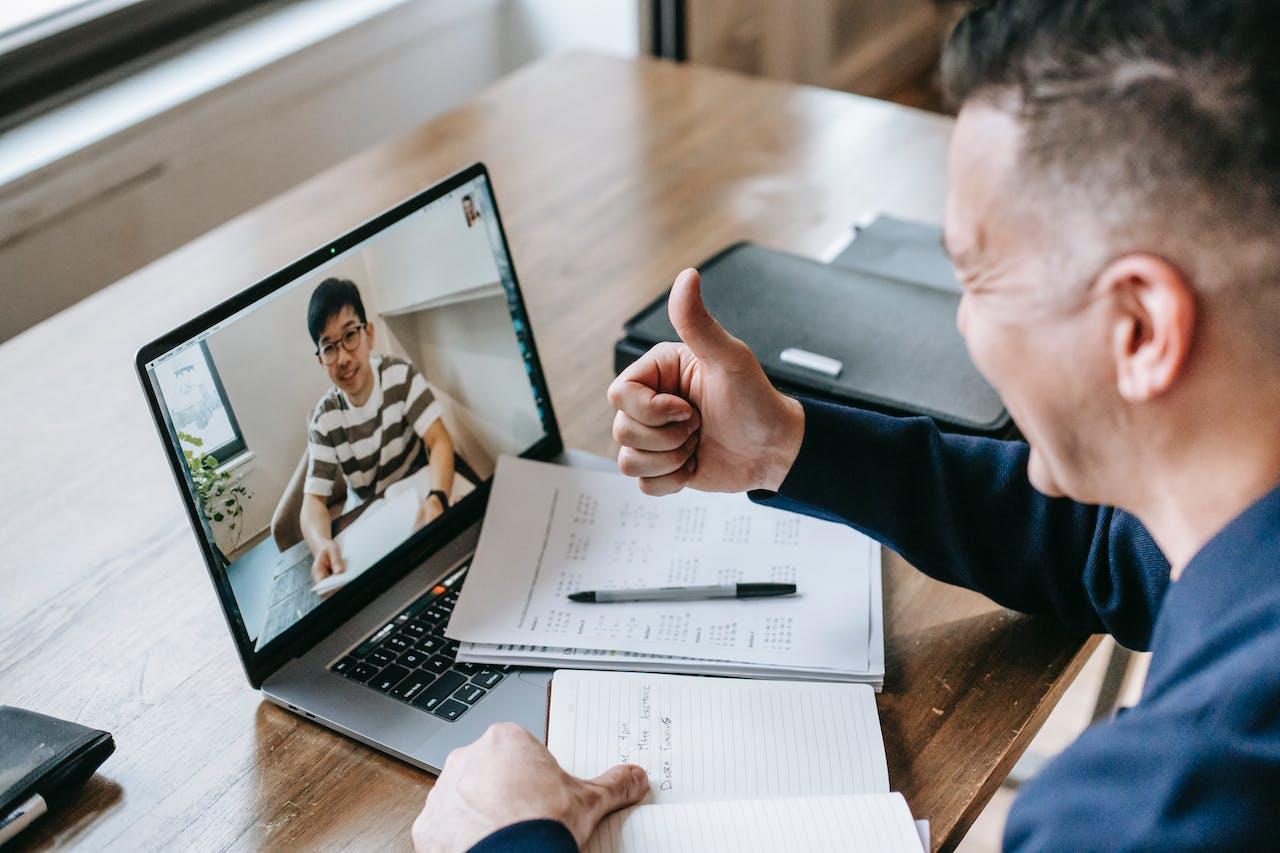 A tutor and a student have a virtual lesson.