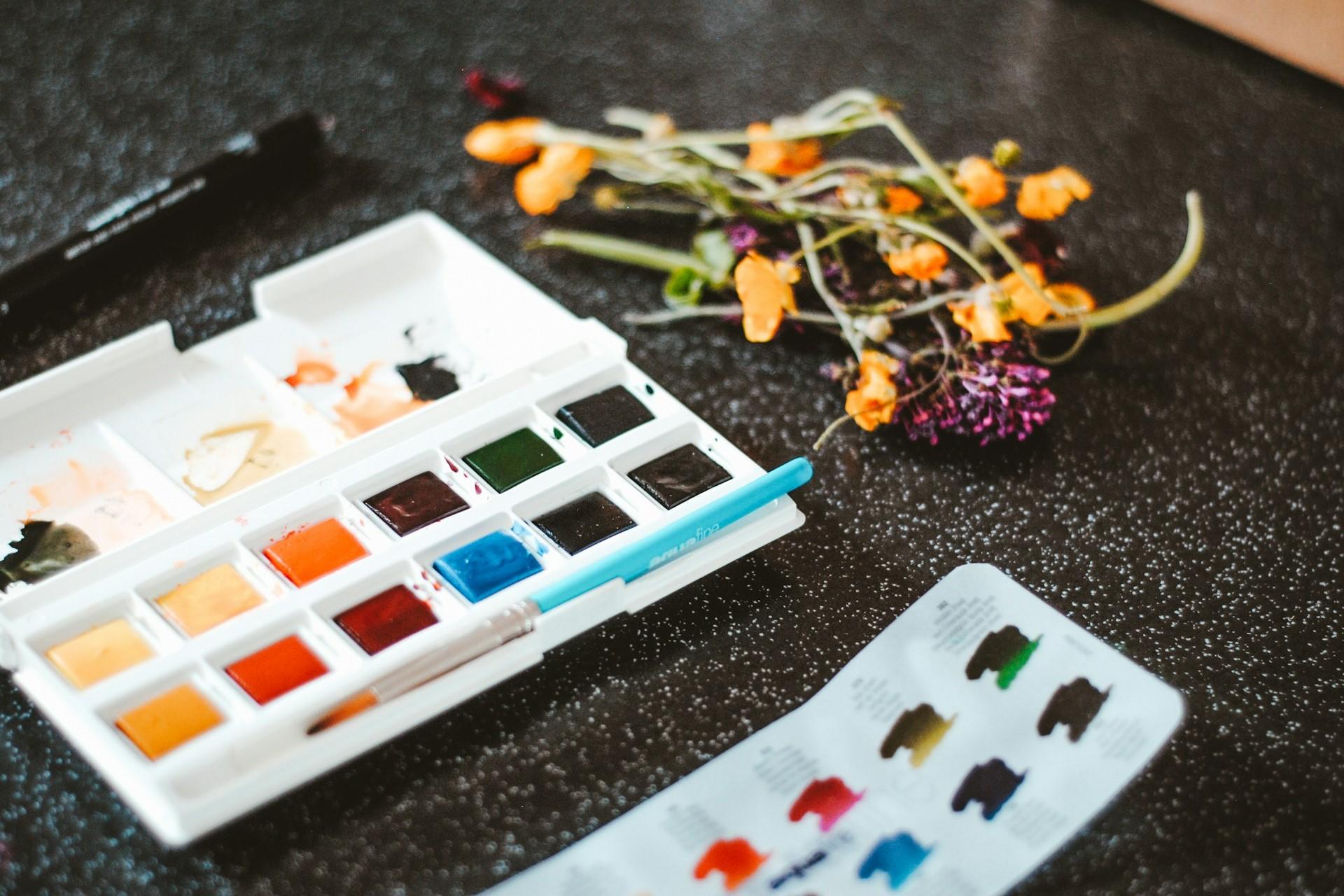 A palette with watercolour paints.