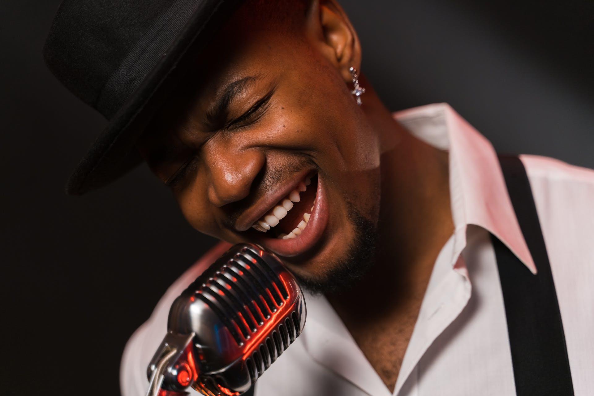 A man singing into a microphone