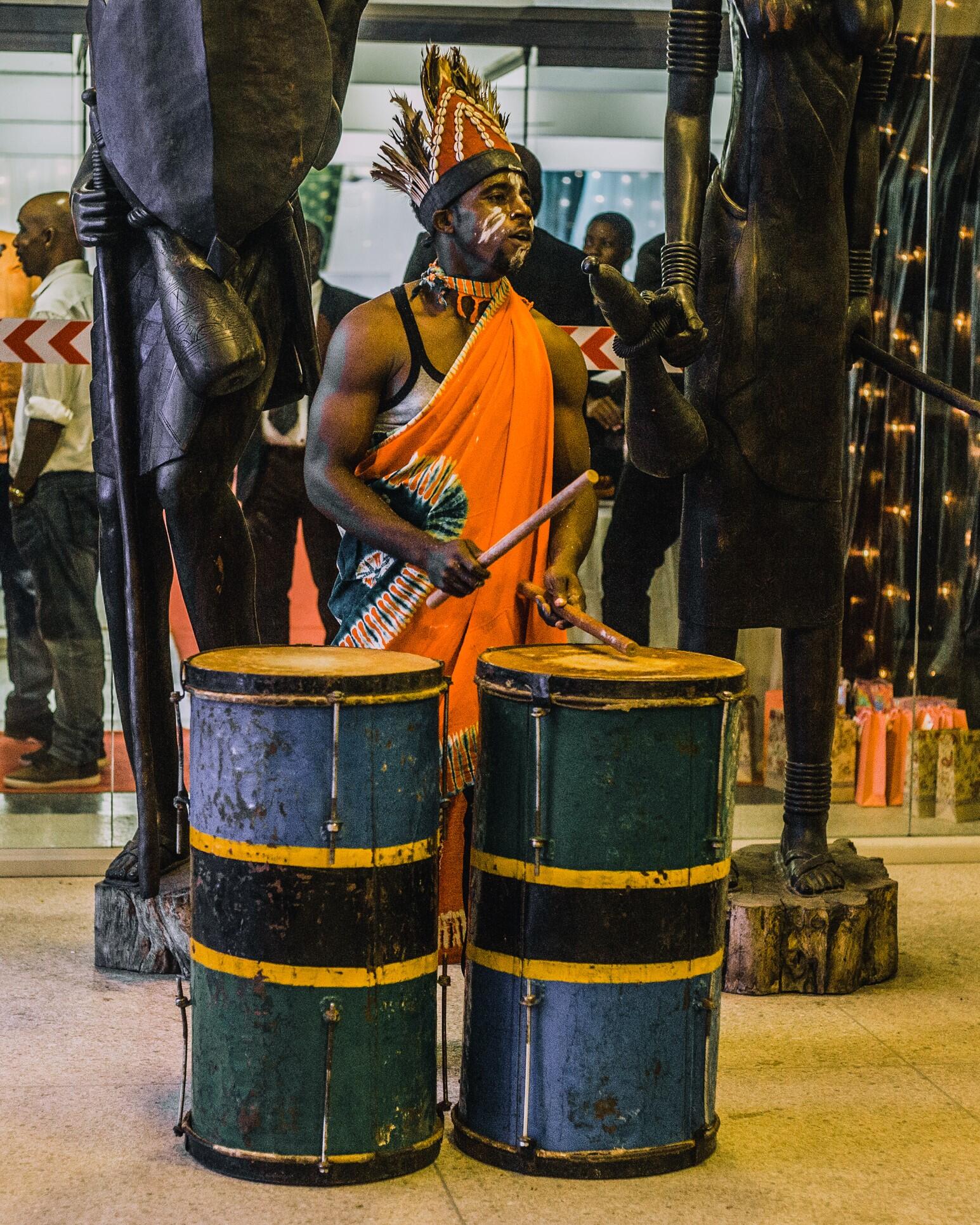 A performer playing ngoma.