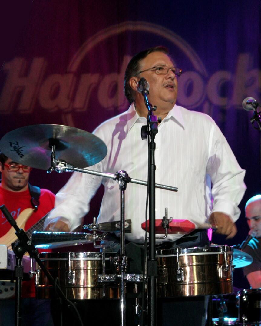 A musician playing timbales.