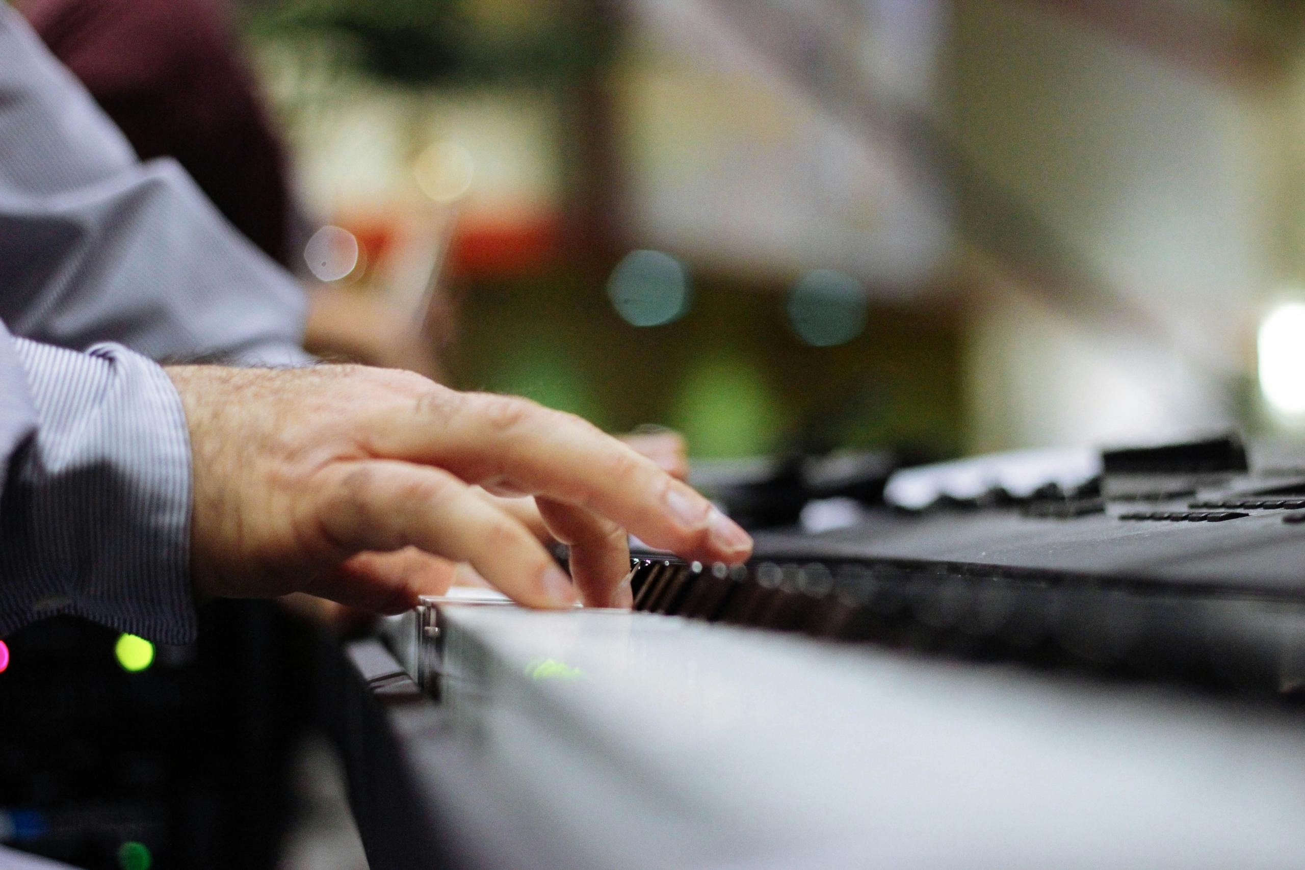 Man playing the piano or keyboard