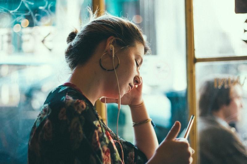 Woman listening to a device