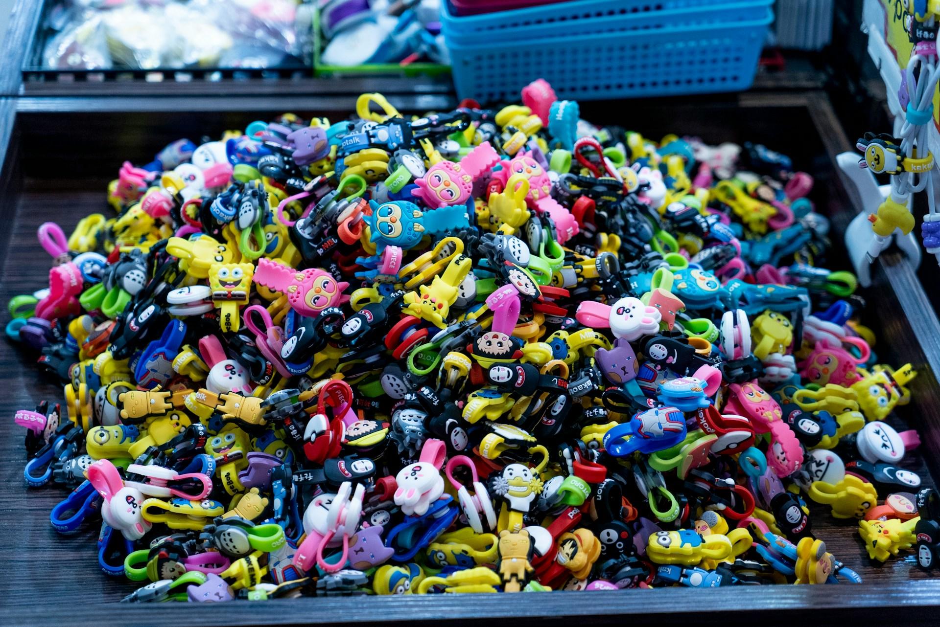 A pile of kawaii keychains and clips.