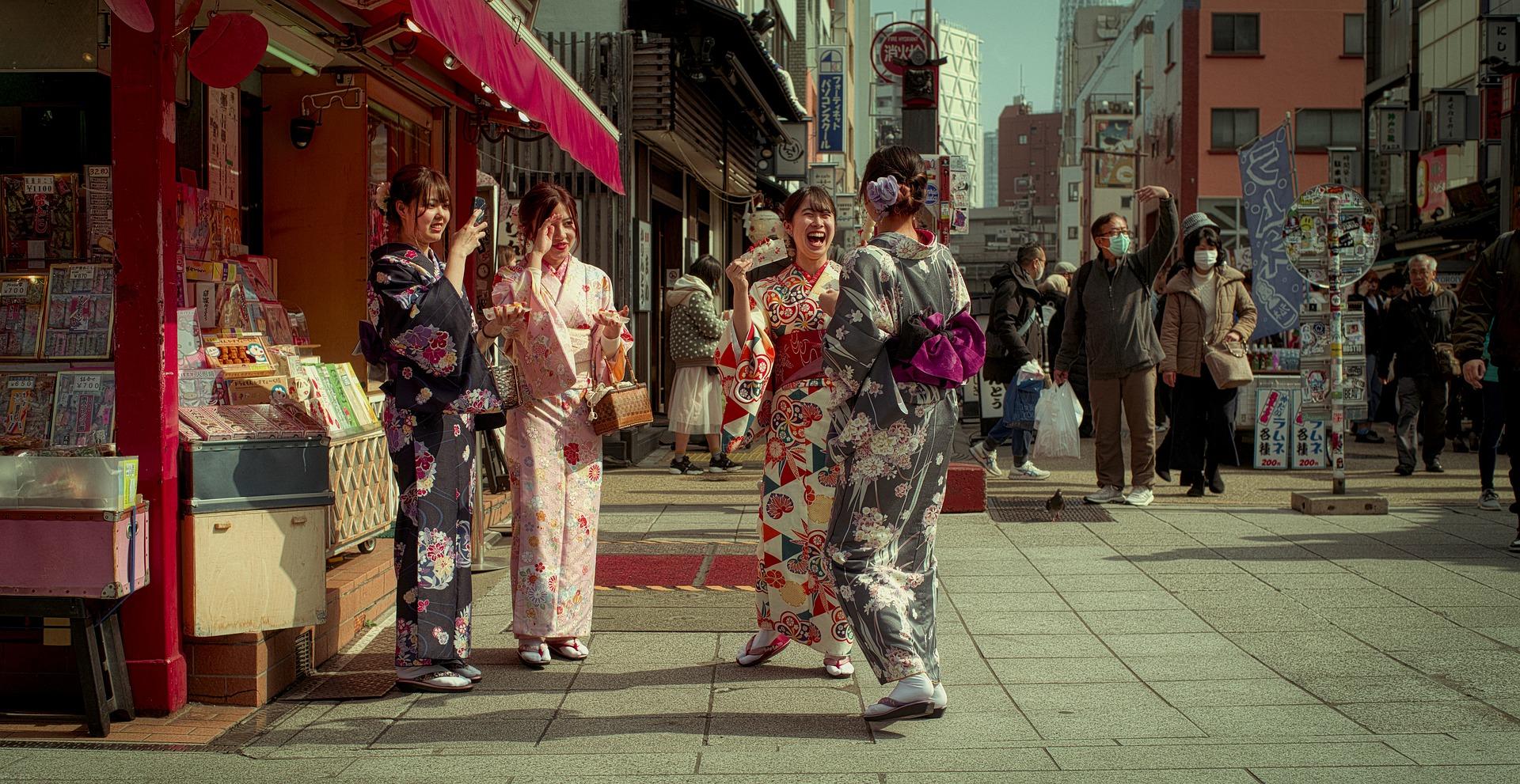 Laughing kimono wearing japanese women in Tokyo