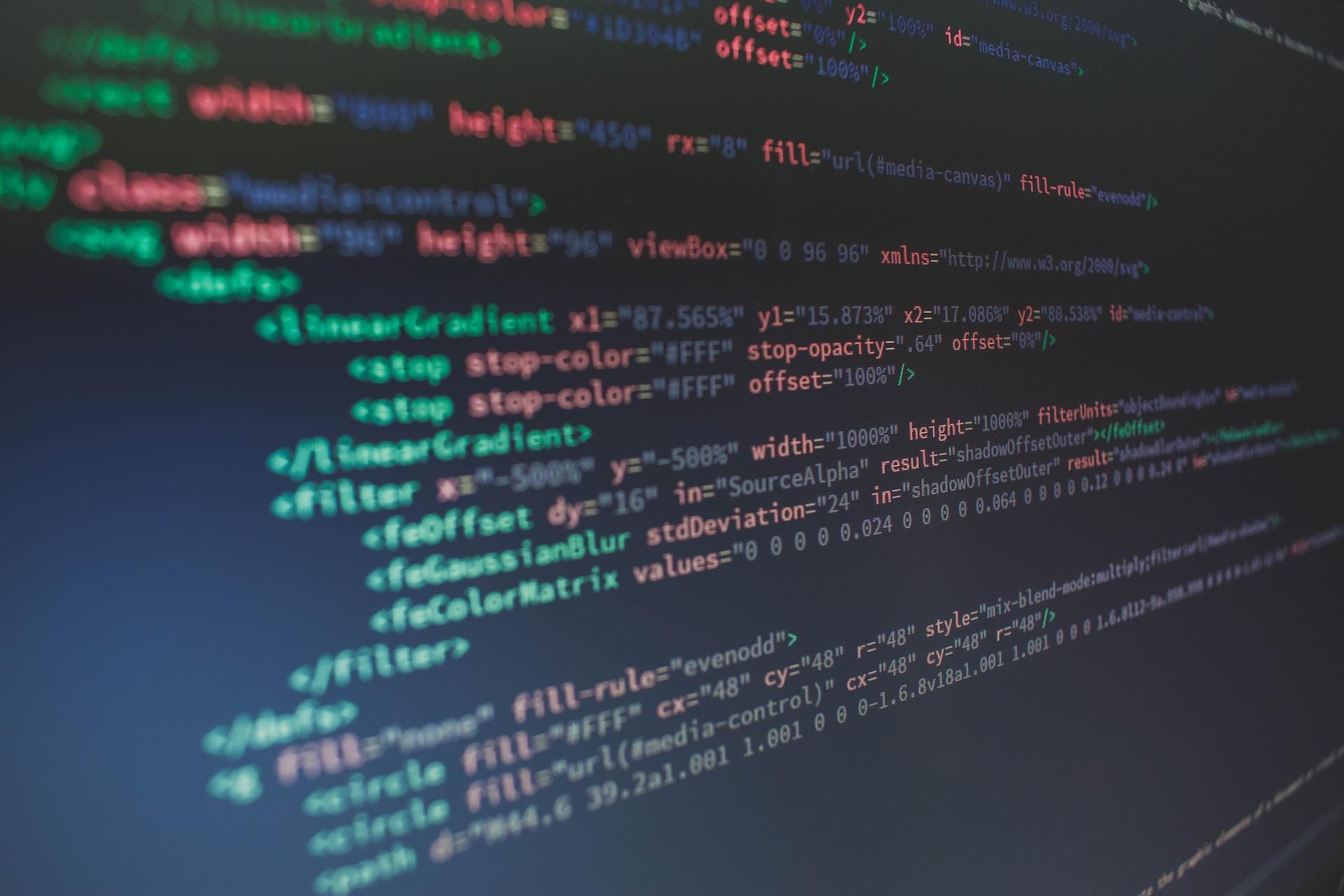 Mostly red and green code on a computer monitor.