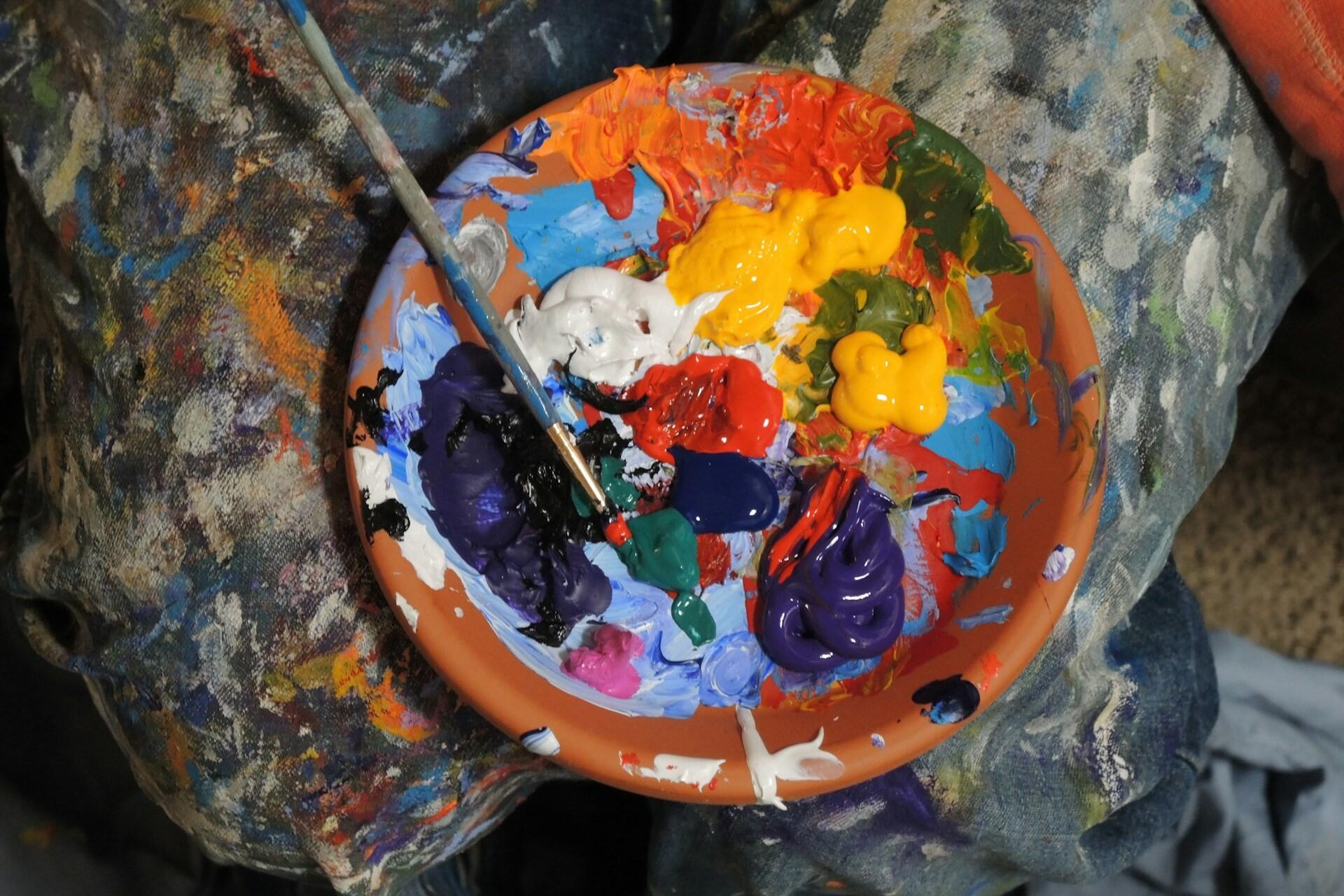 Some paints on a plate.