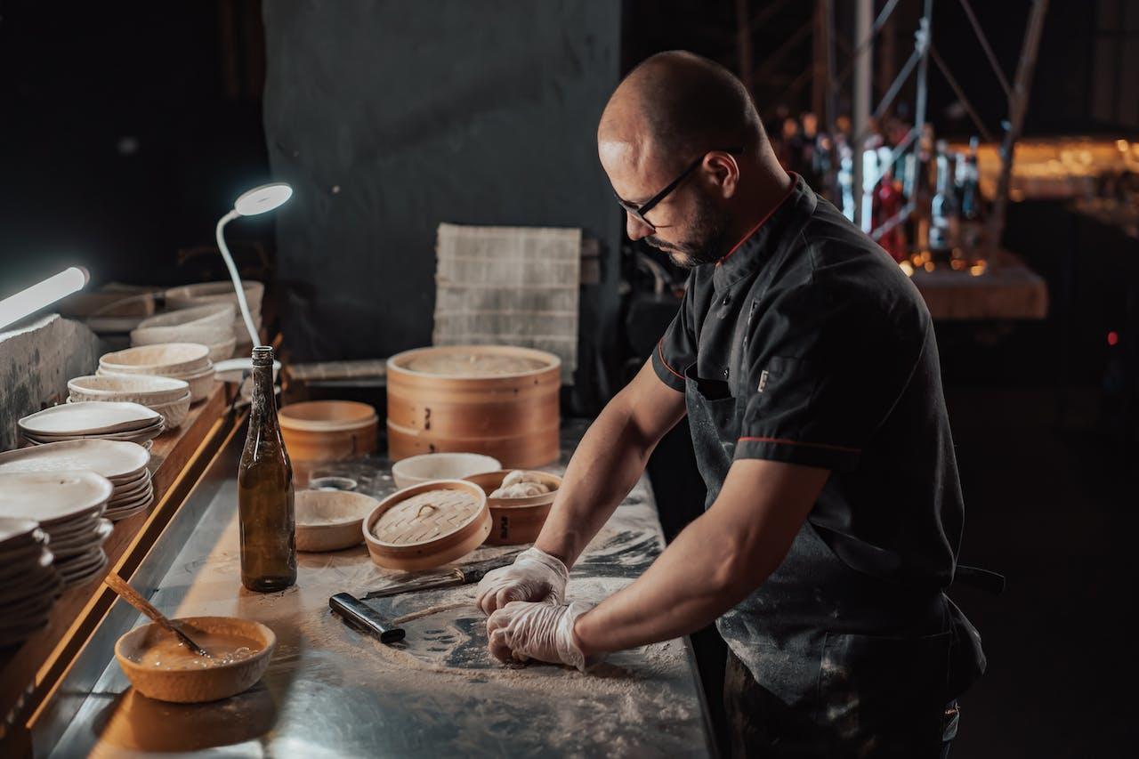 a chef makes dumplings by hand