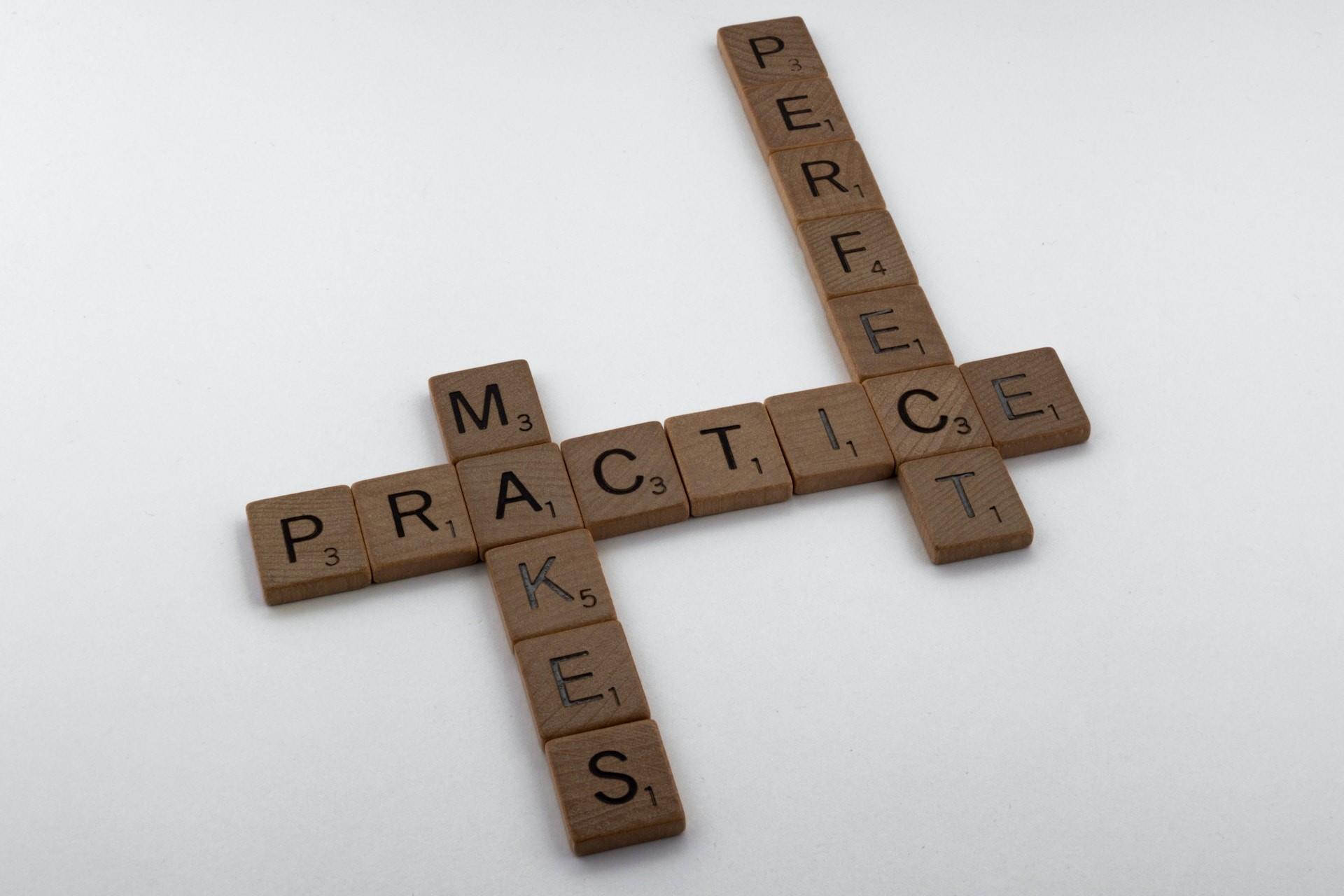 Scrabble tiles arranged into a crossword.