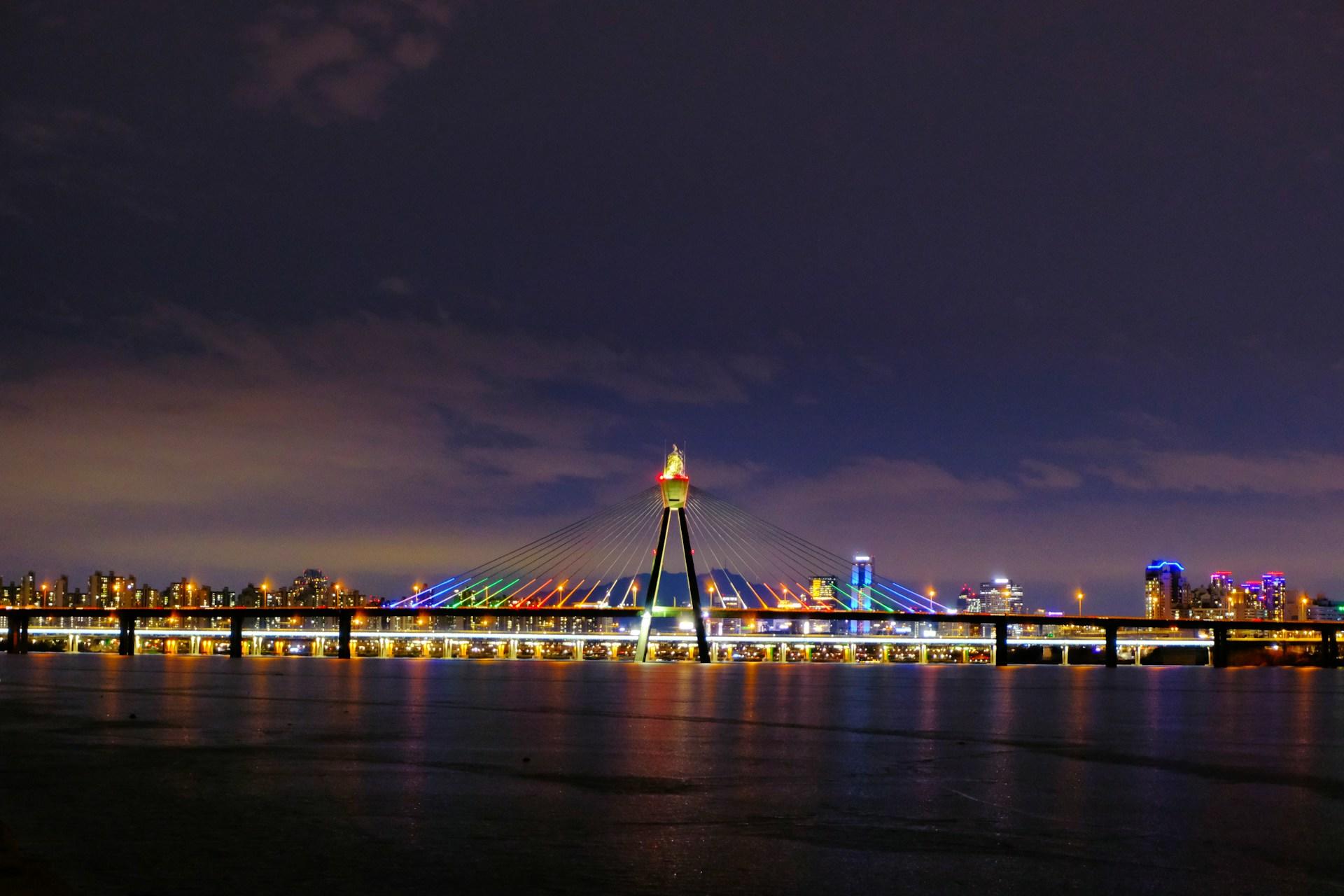 A view of a bridge in South Korea at night.