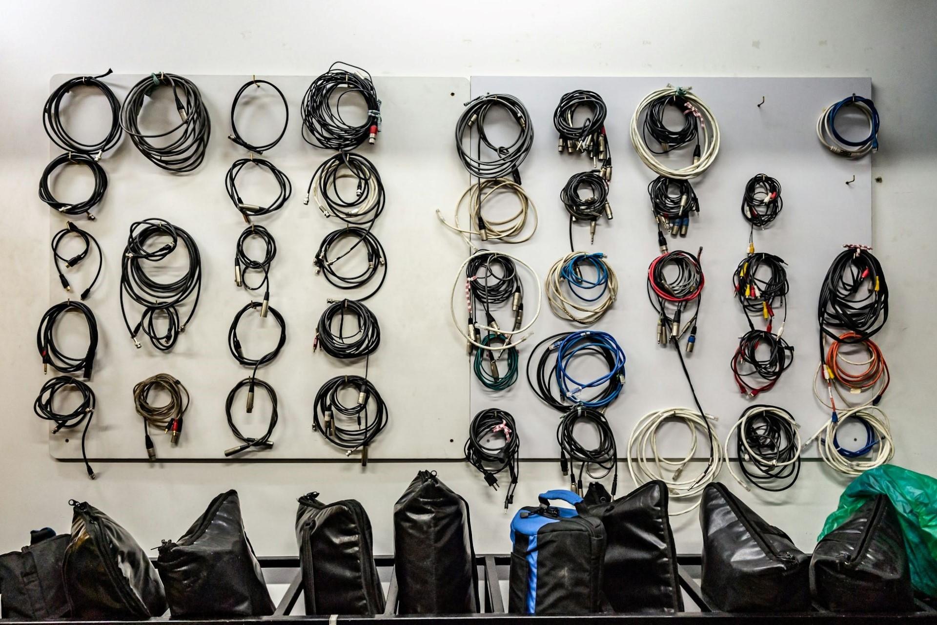 A wall with audio cables.