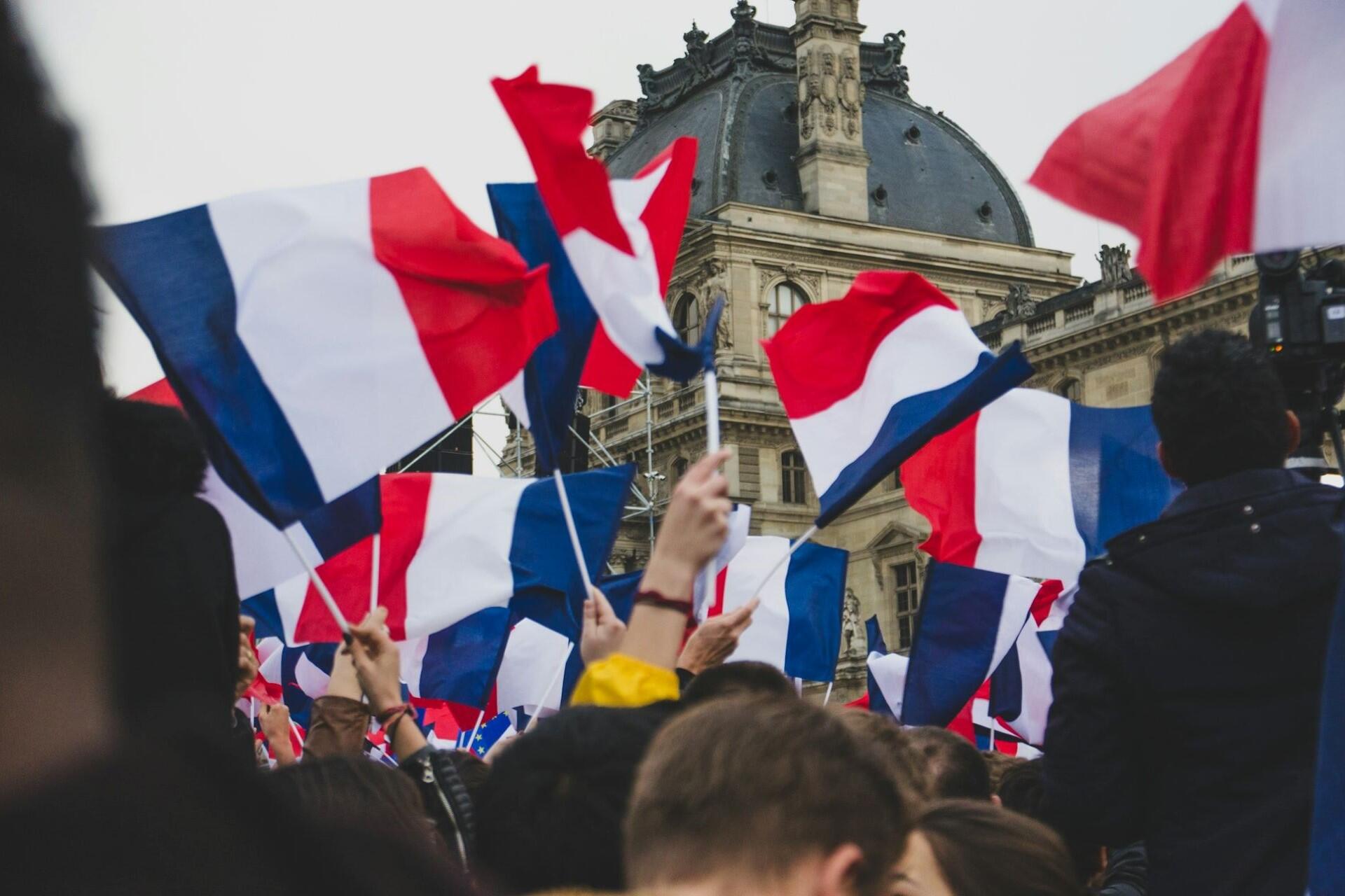 French flags waving in France.