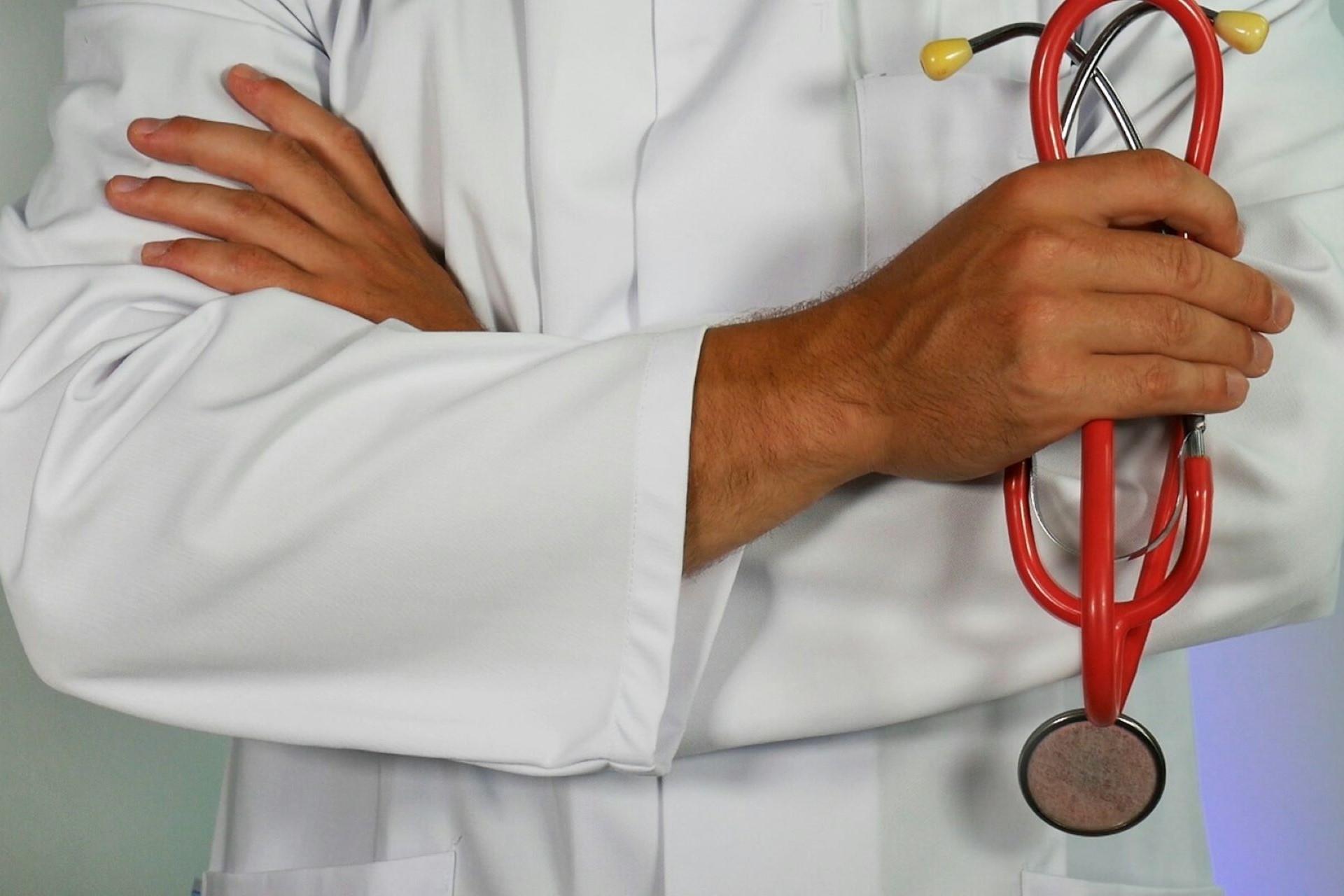 A doctor with a red stethoscope.