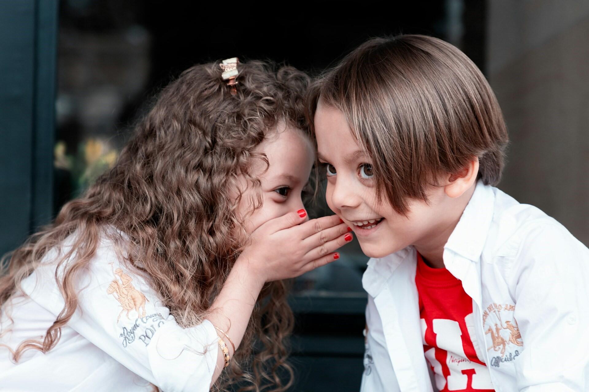 Two kids chatting.