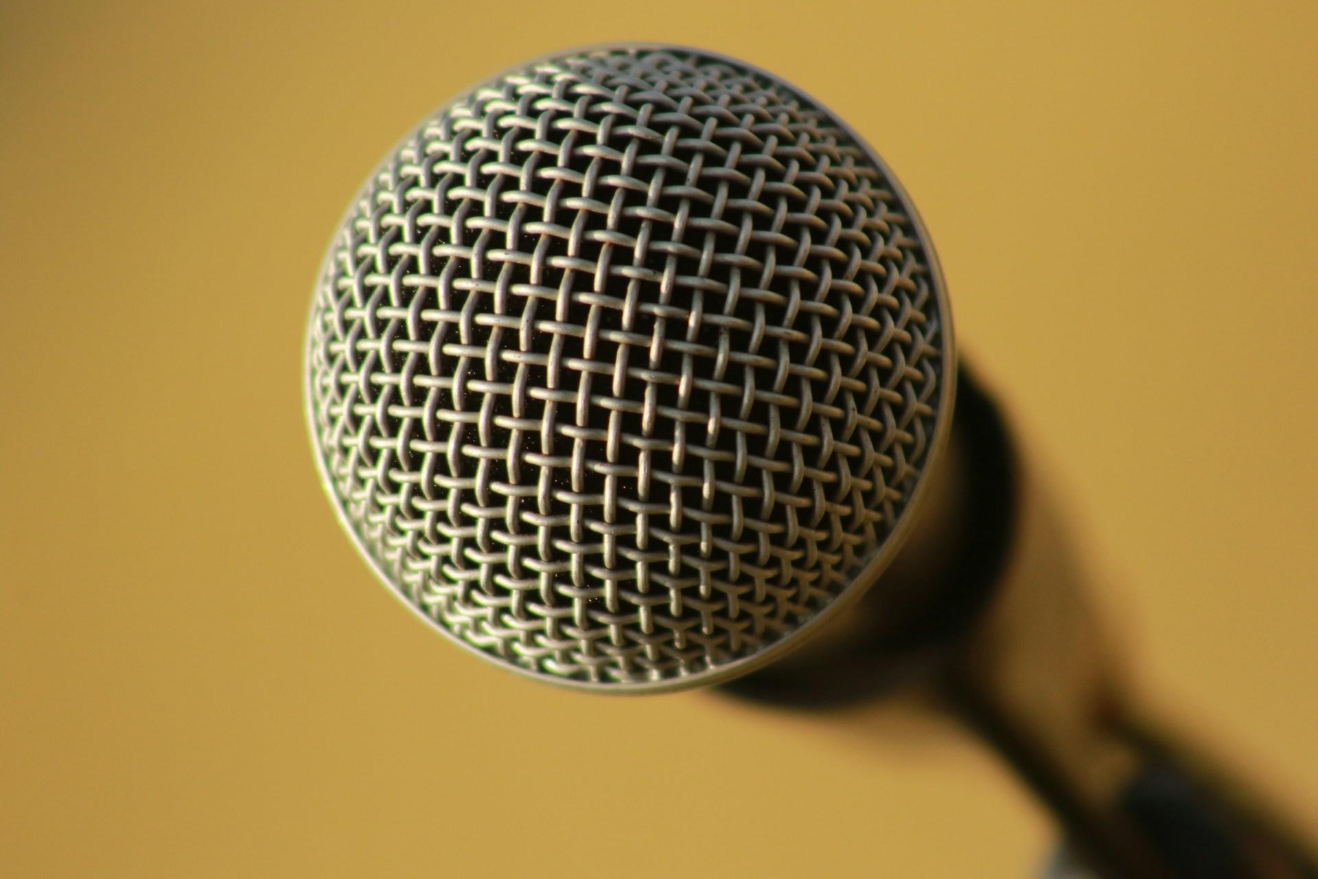 A closeup of a singer's microphone.