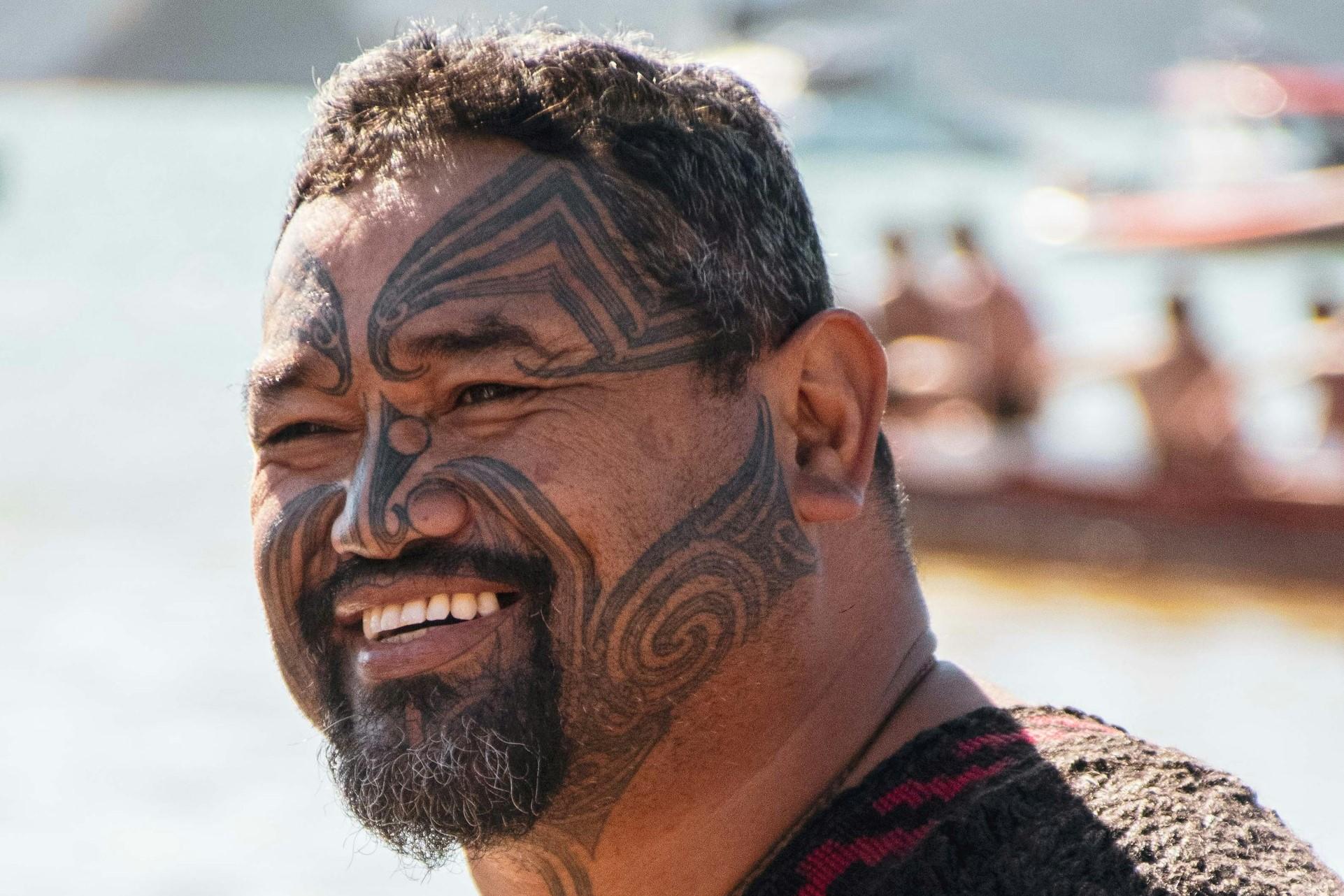 A Maori person with a moko.