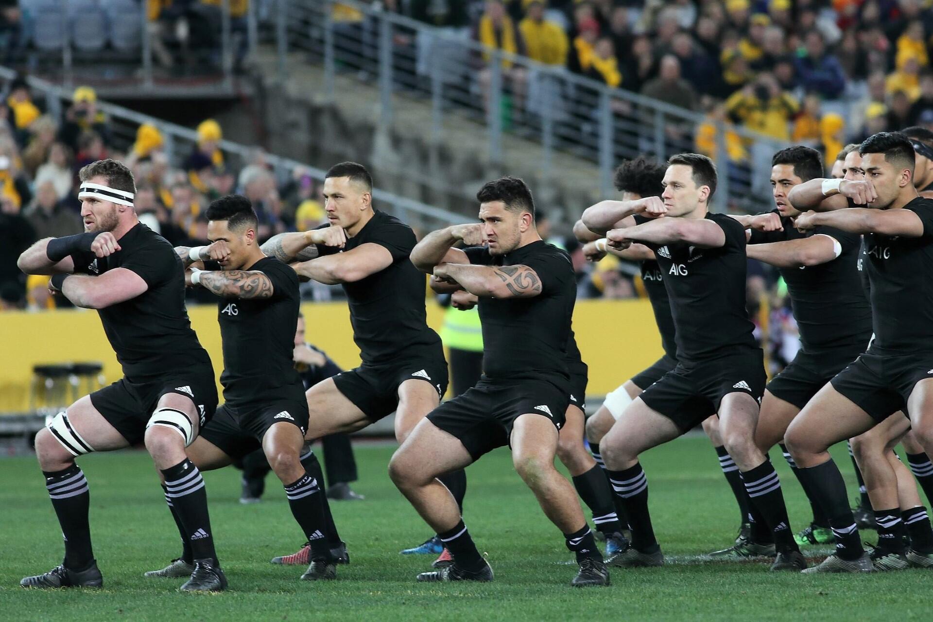 The All Blacks performing a haka before a match.