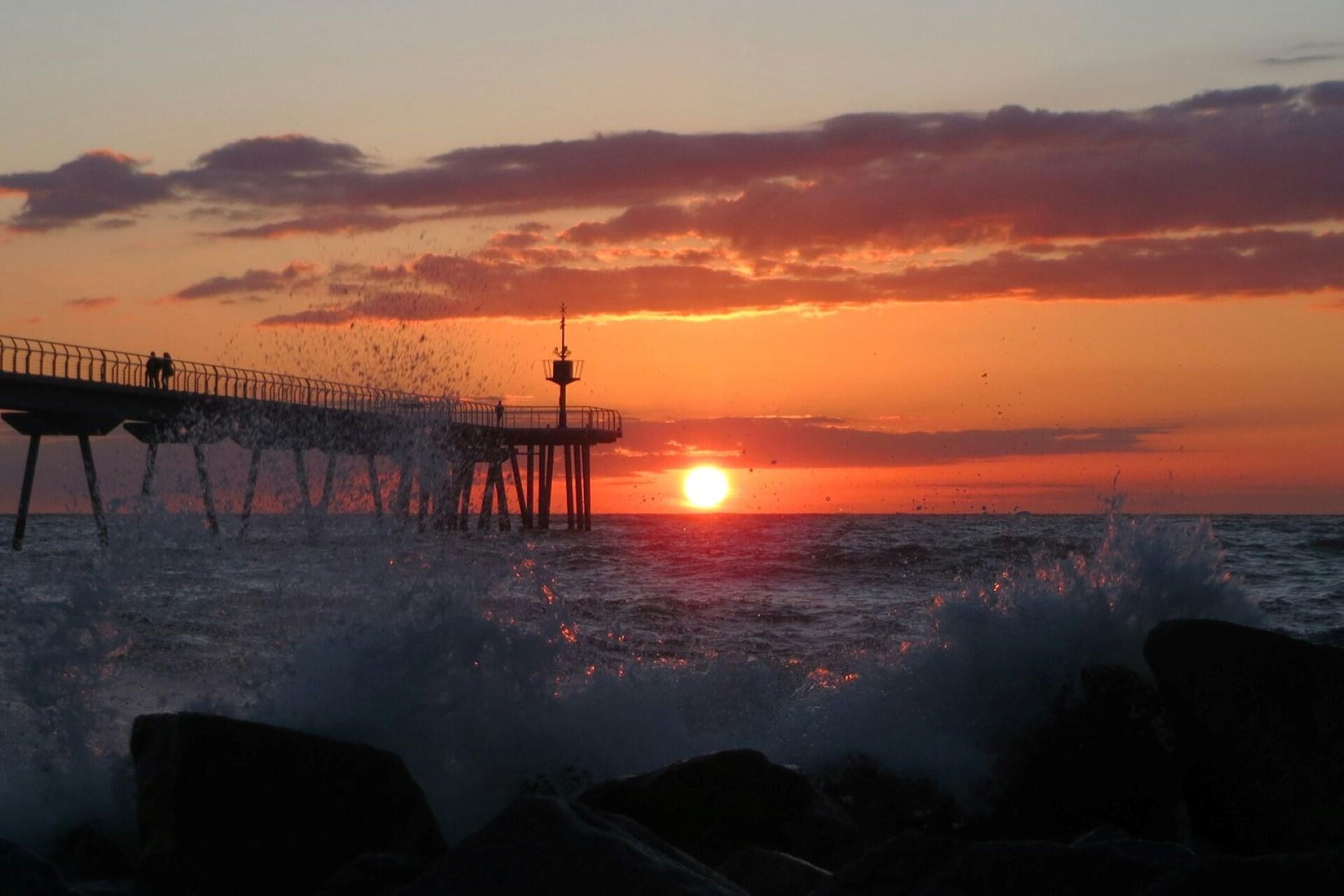 A sunrise at a jetty in Spain.