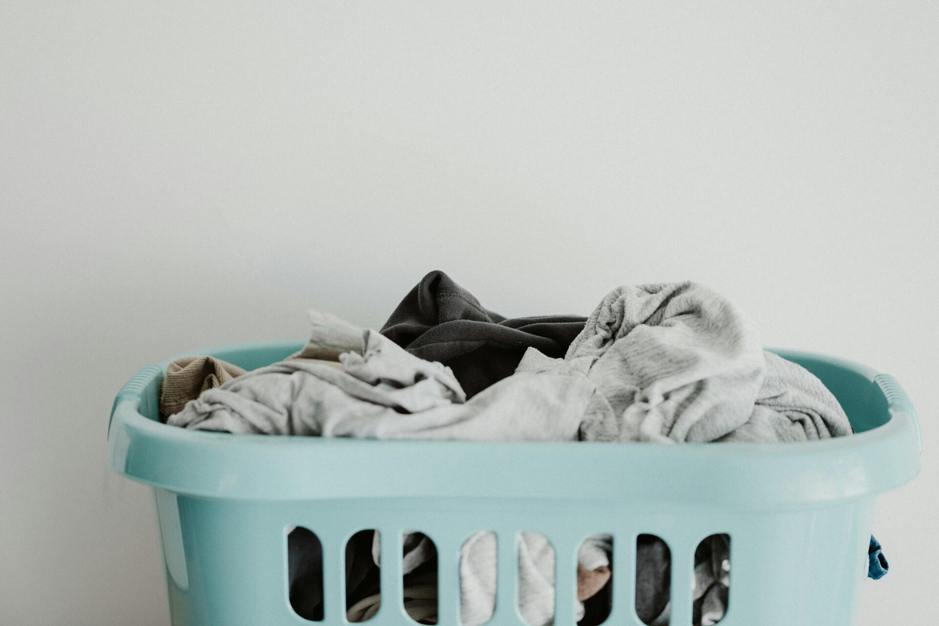 laundry basket with clothes representing washing day tradition