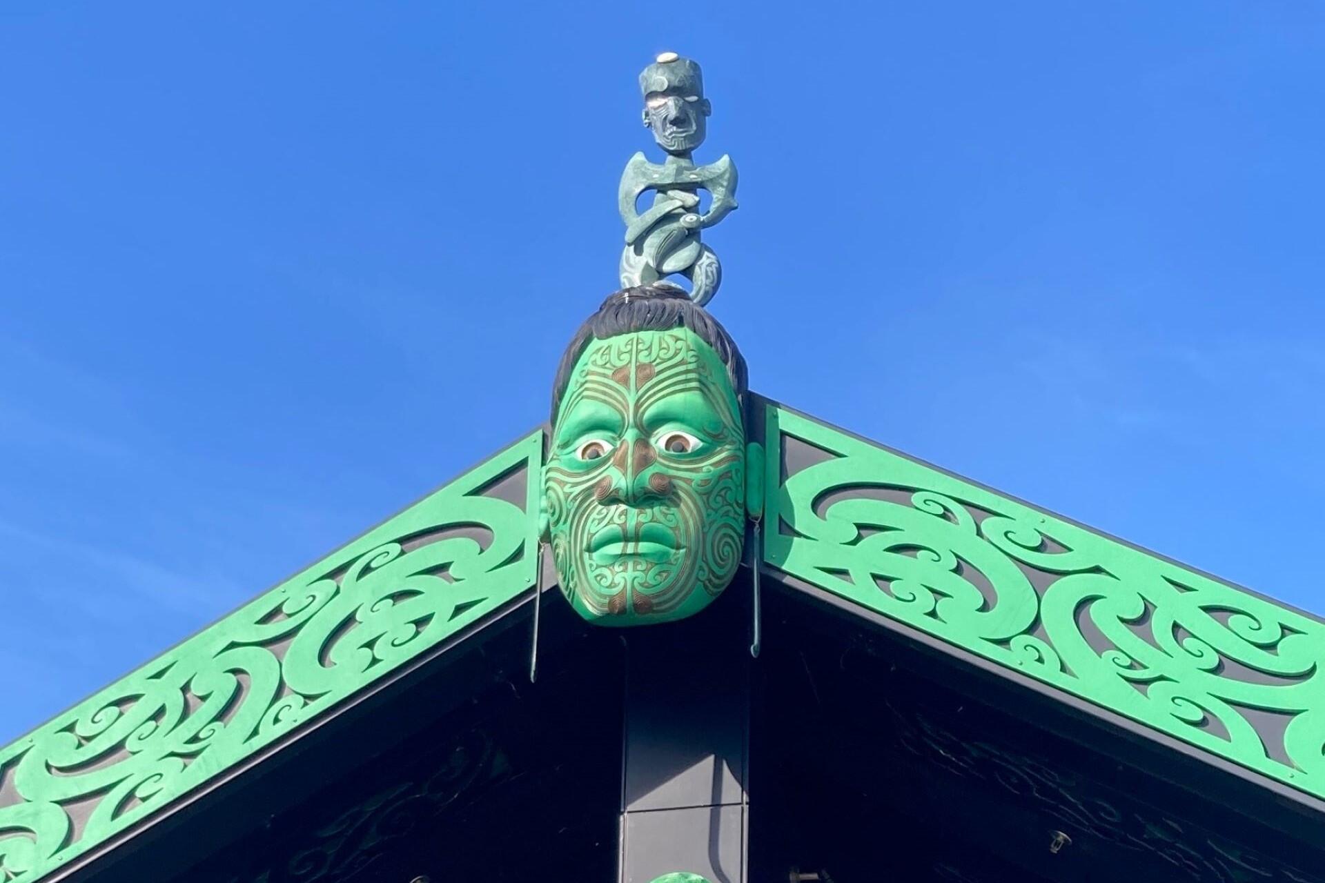 A wood carving on a Maori marae.