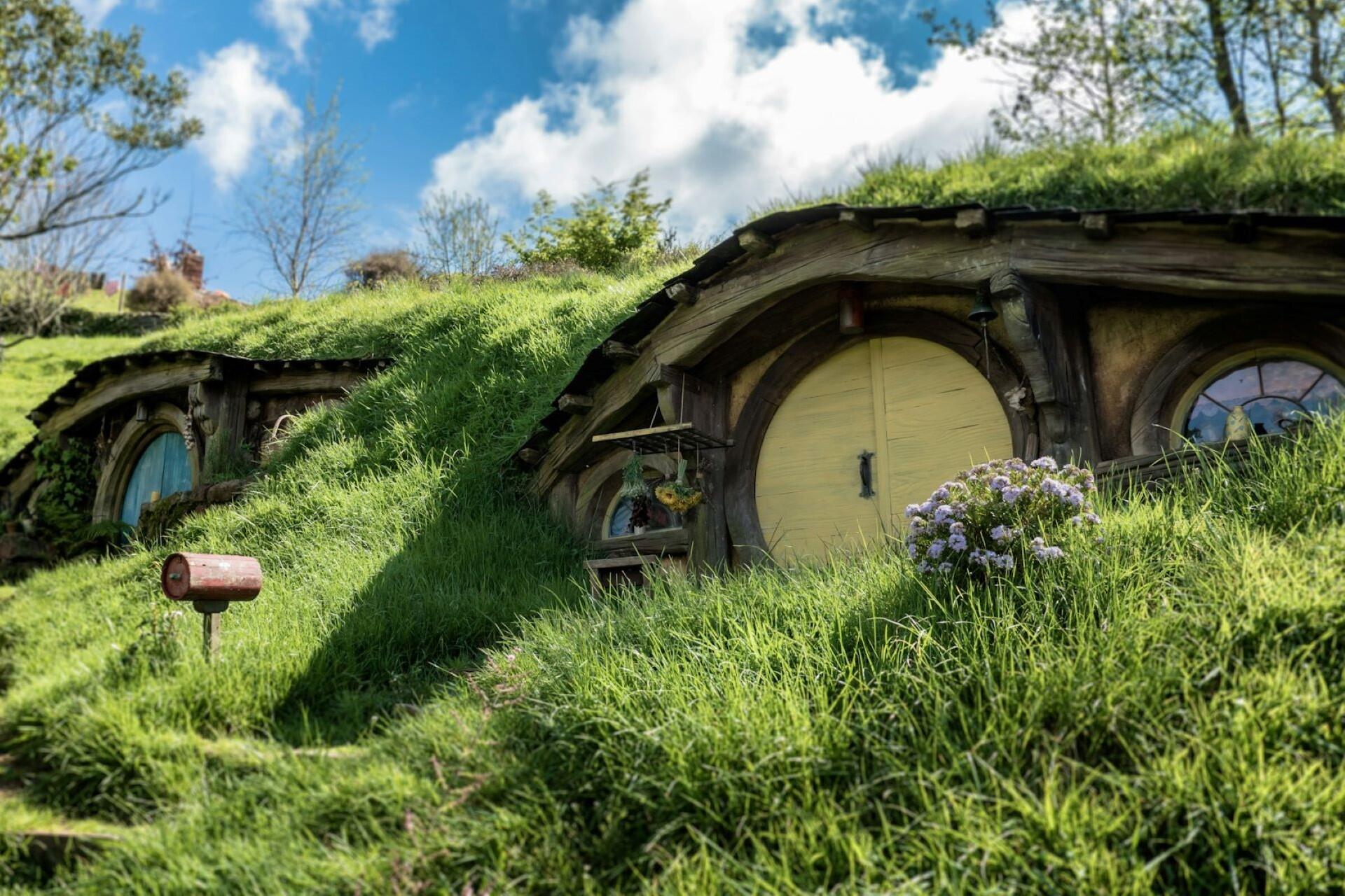 A couple of Hobbit Holes in Hobbiton, New Zealand.
