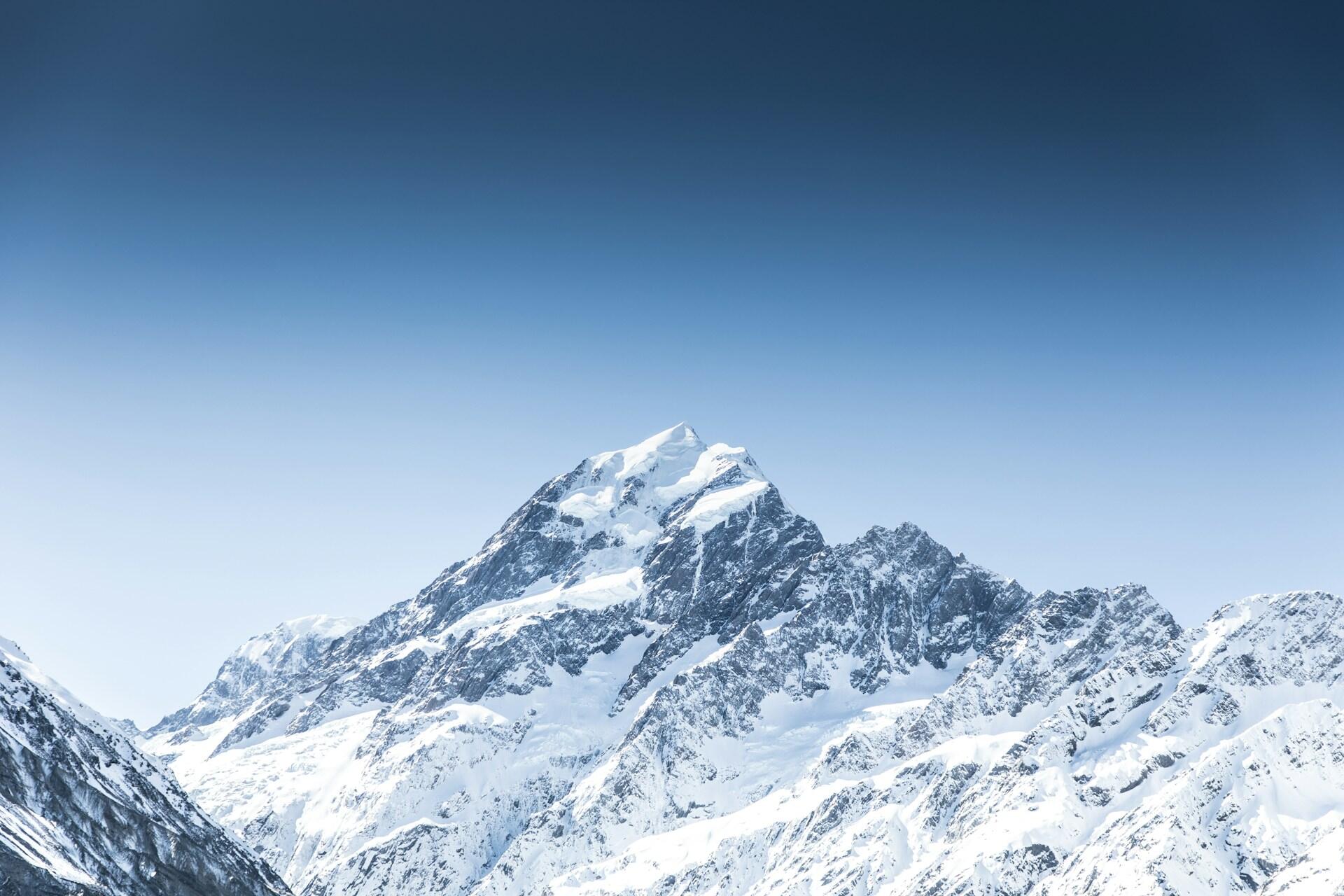 The snow-capped peaks of Mount Cook, New Zealand.