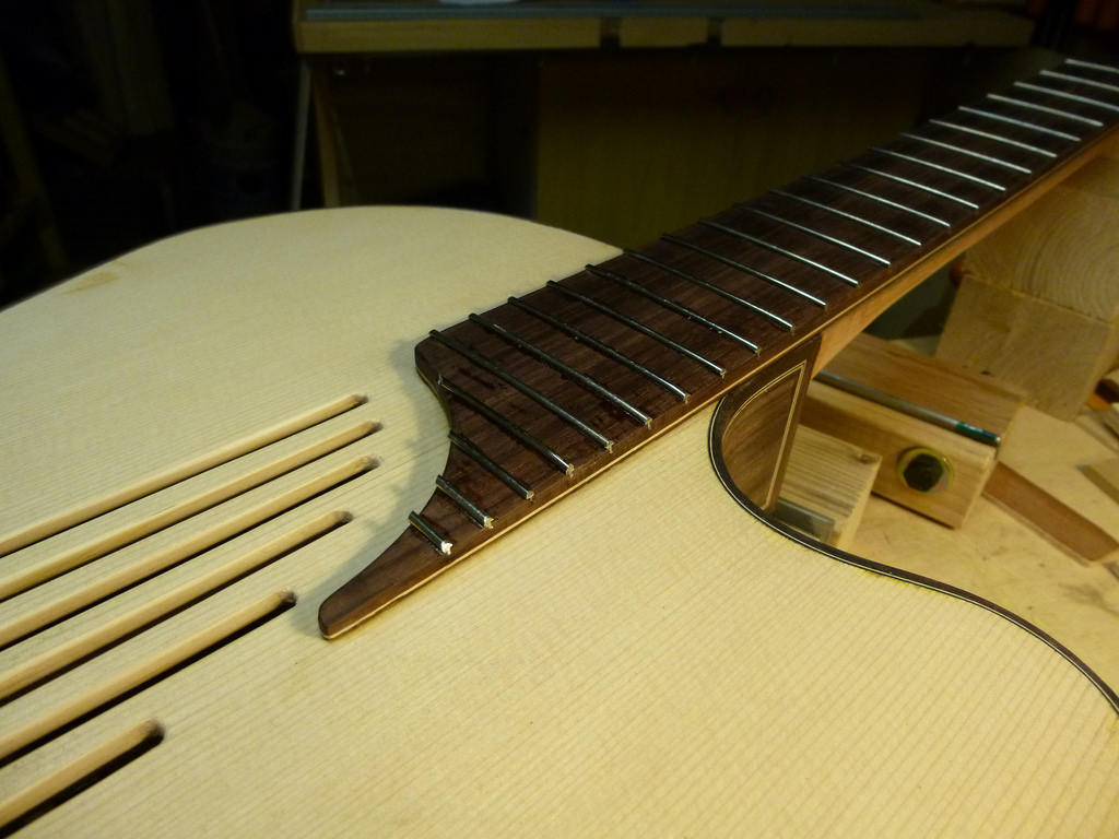 A guitar in the process of manufacture - still lacking the strings.