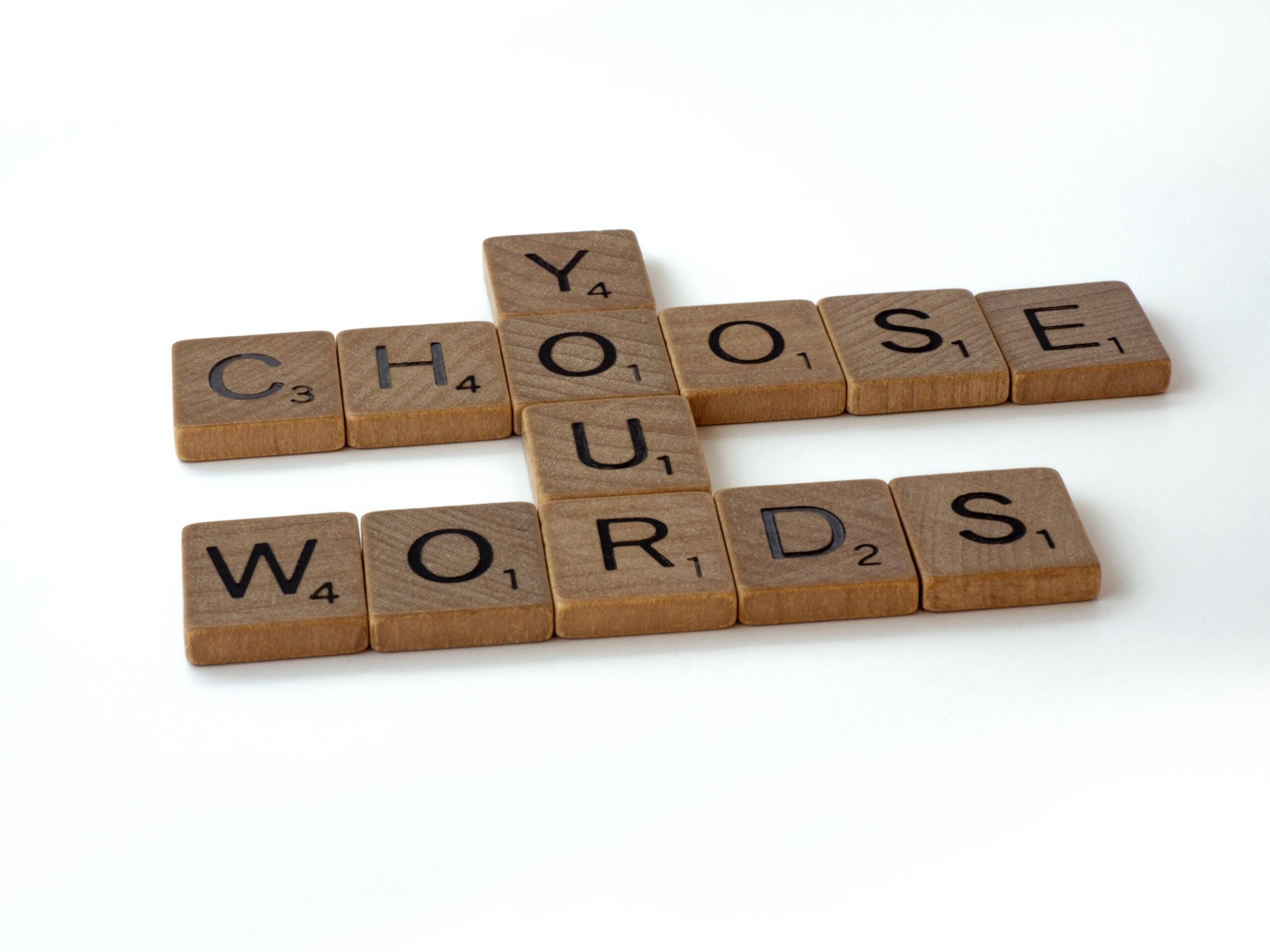 Wooden tiles with letters forming words