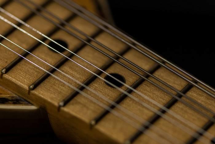 An unusual eight-string guitar.