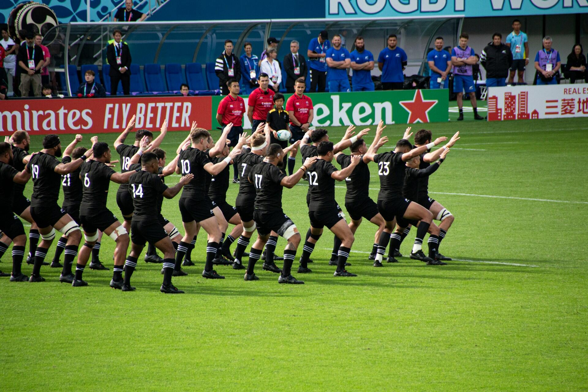 New Zealand rugby players performing a haka before a match