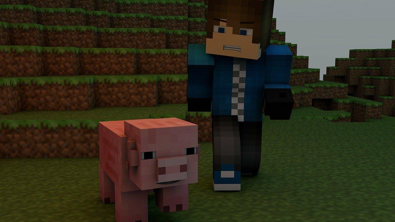 postacie chłopca i świni z gry minecraft