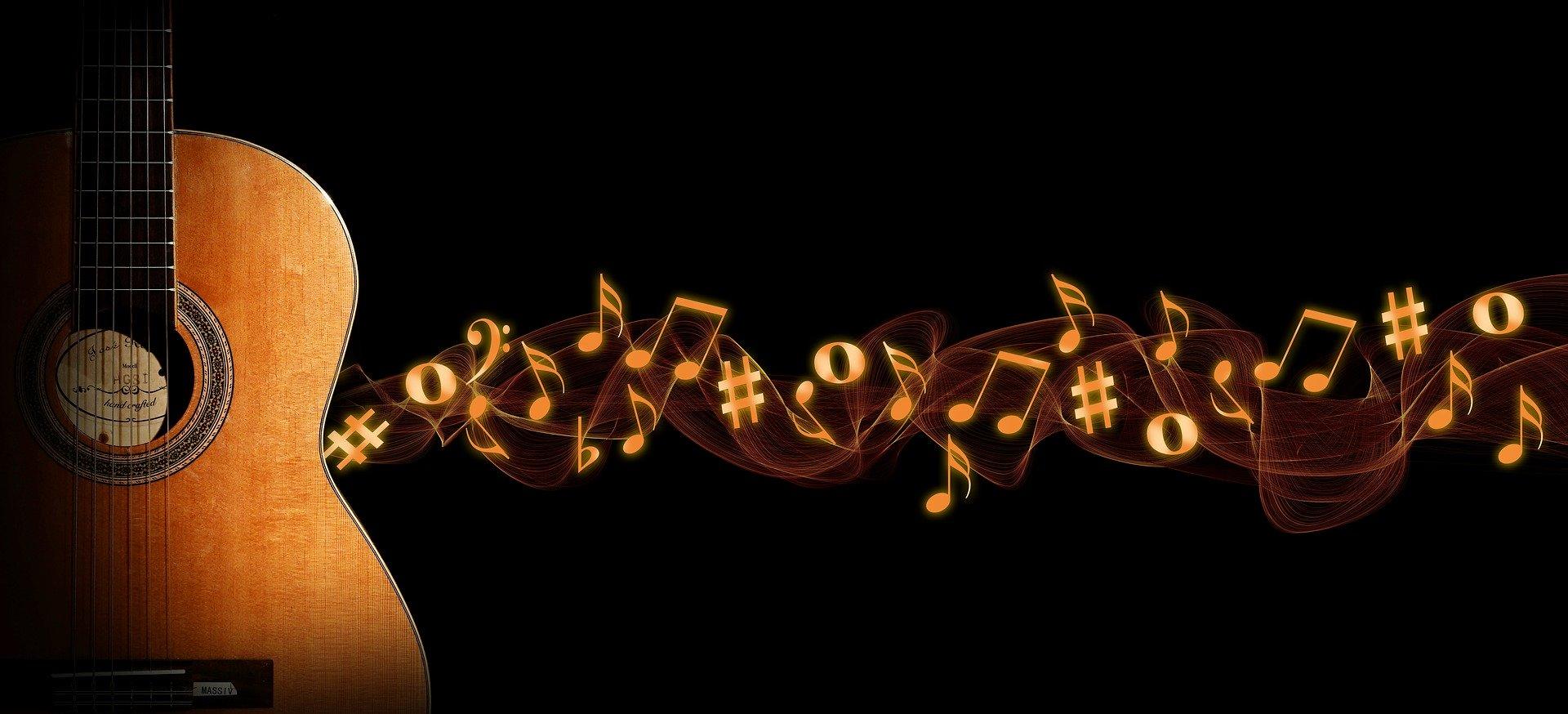 Imagem gráfica de uma guitarra de onde saem notas musicais