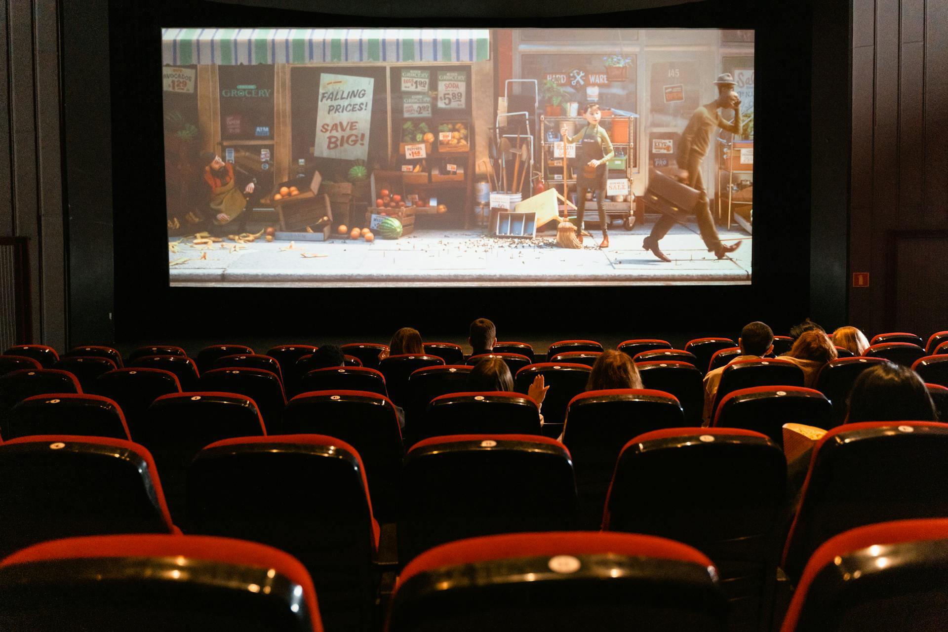 pessoas a ver filme no cinema