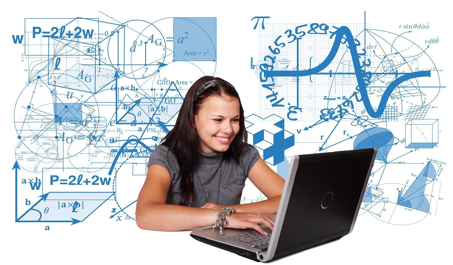 Jovem estudante a utilizar computador portátil para estudar.