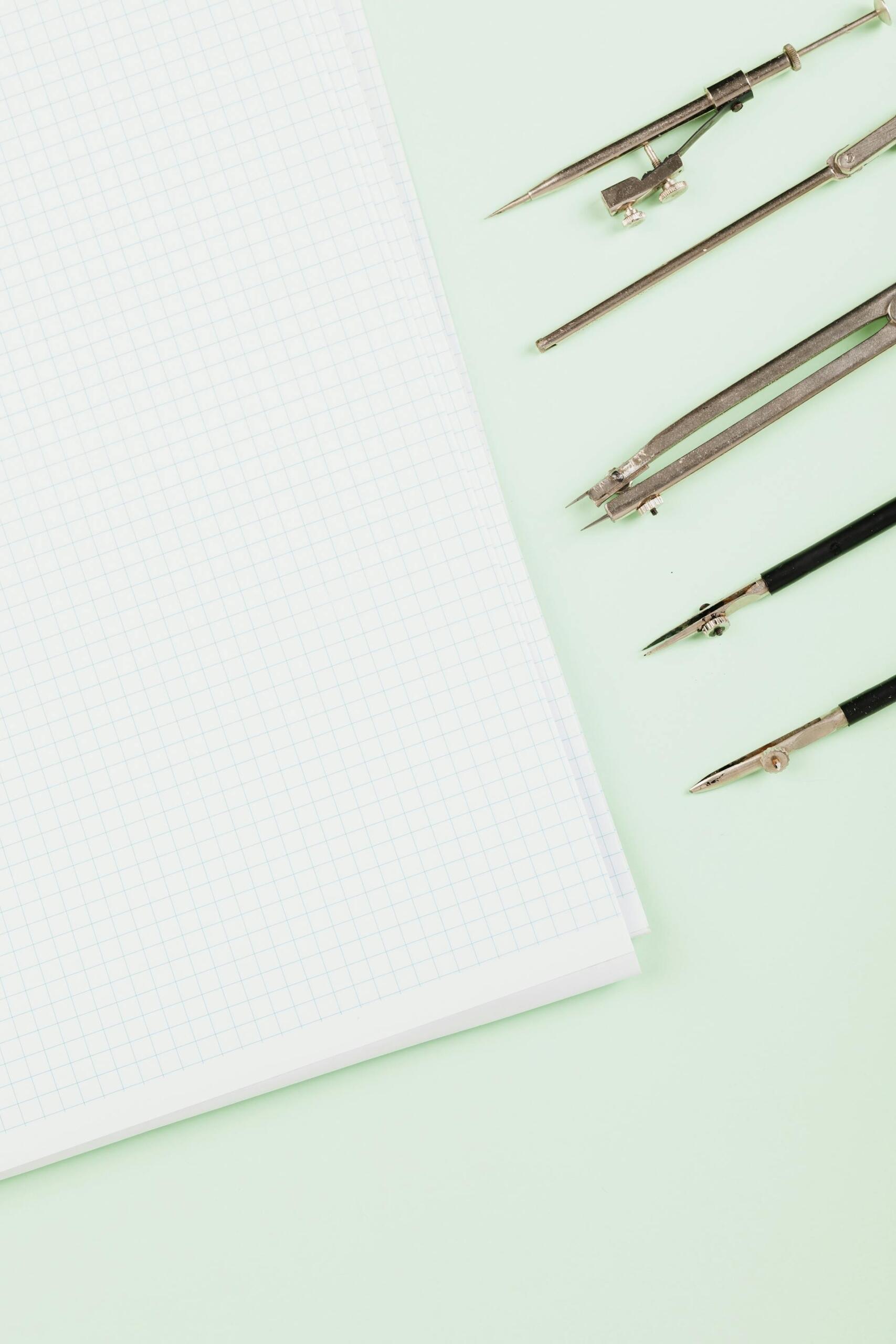 compasso e papel quadriculado