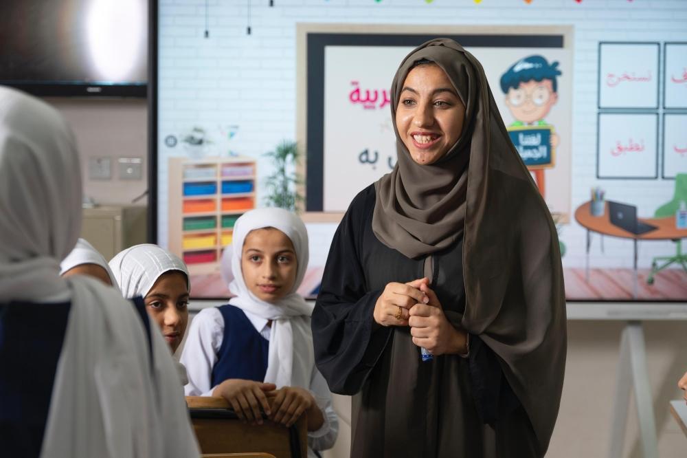 طلاب يستعدون للعودة إلى المدرسة في بداية العام الدراسي