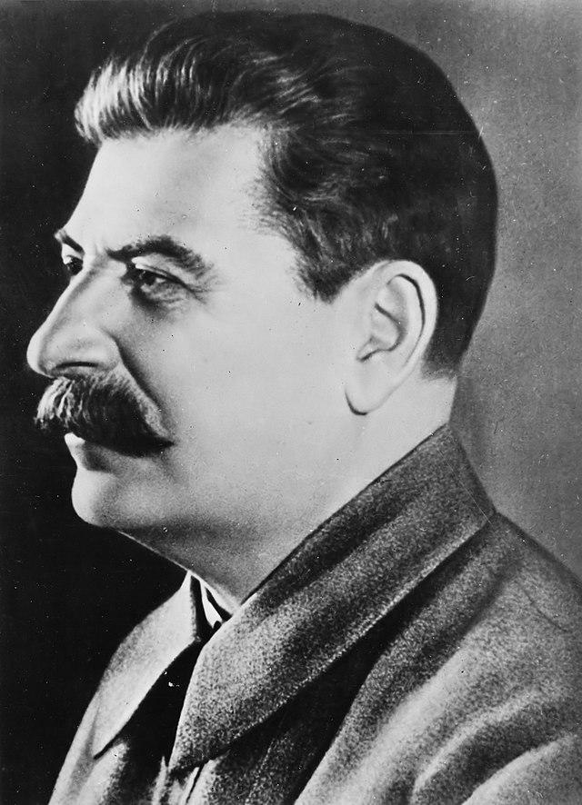 Joseph Stalin posing for a photograph