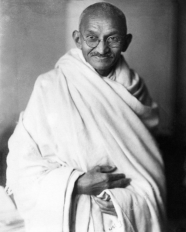 Mahatma Gandhi posing for the camera