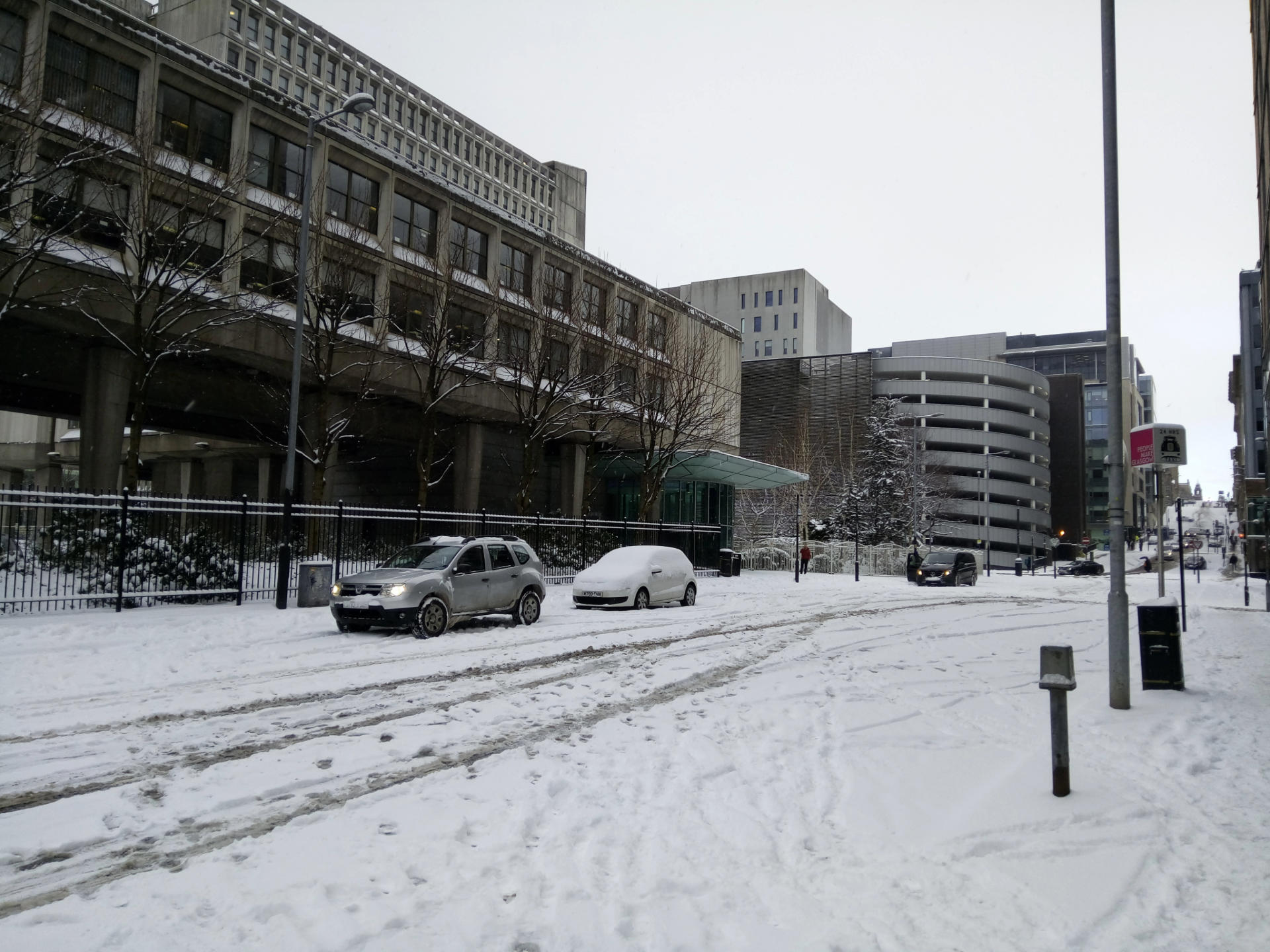 Snow on city street in glasgow