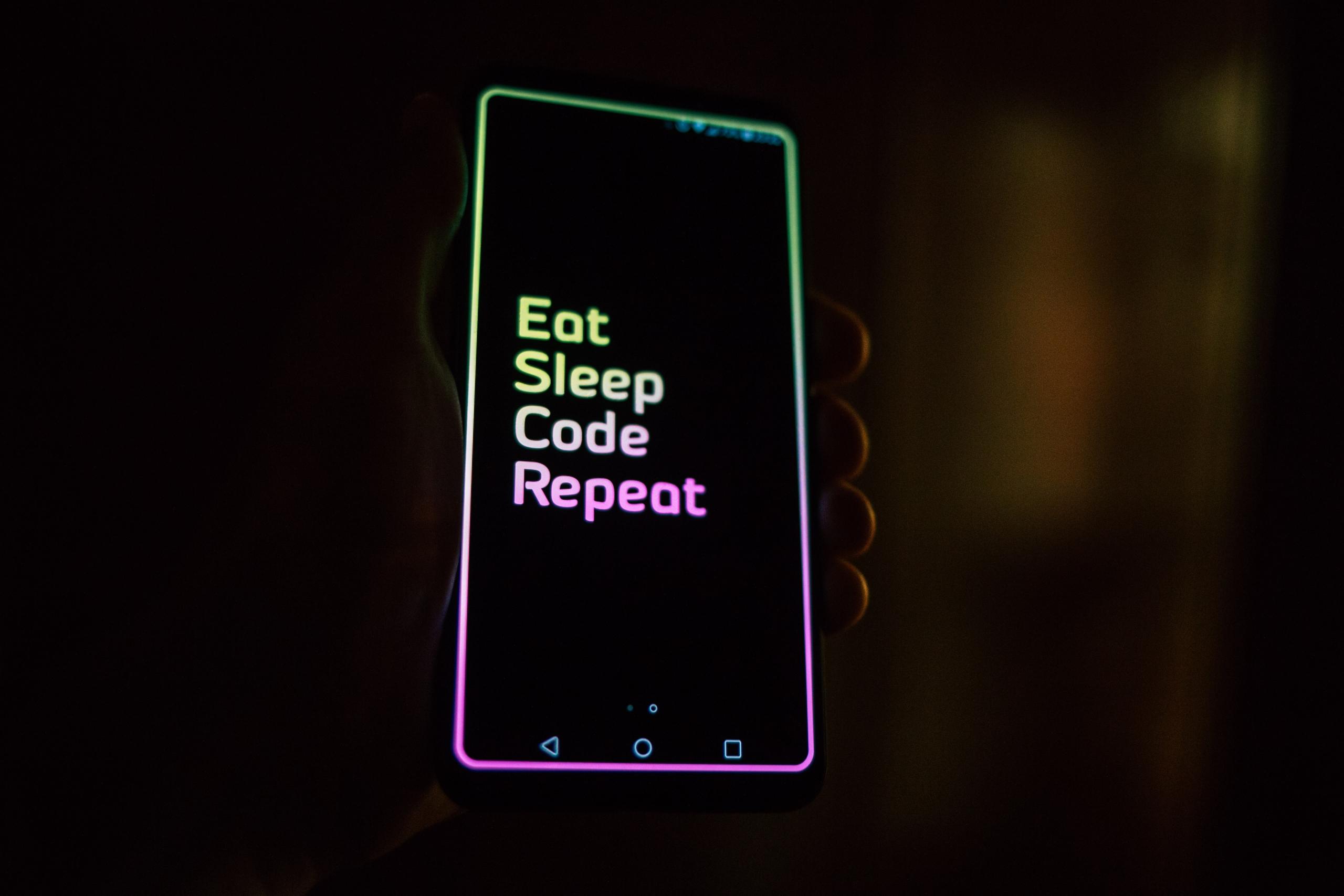 neonskylt som uppmuntrar programmering