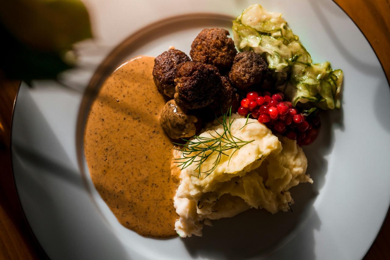 Swedish meatballs with mashed potatoes and pickled cucumber