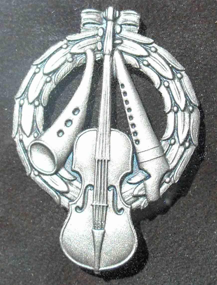 Zornmärket i silver.