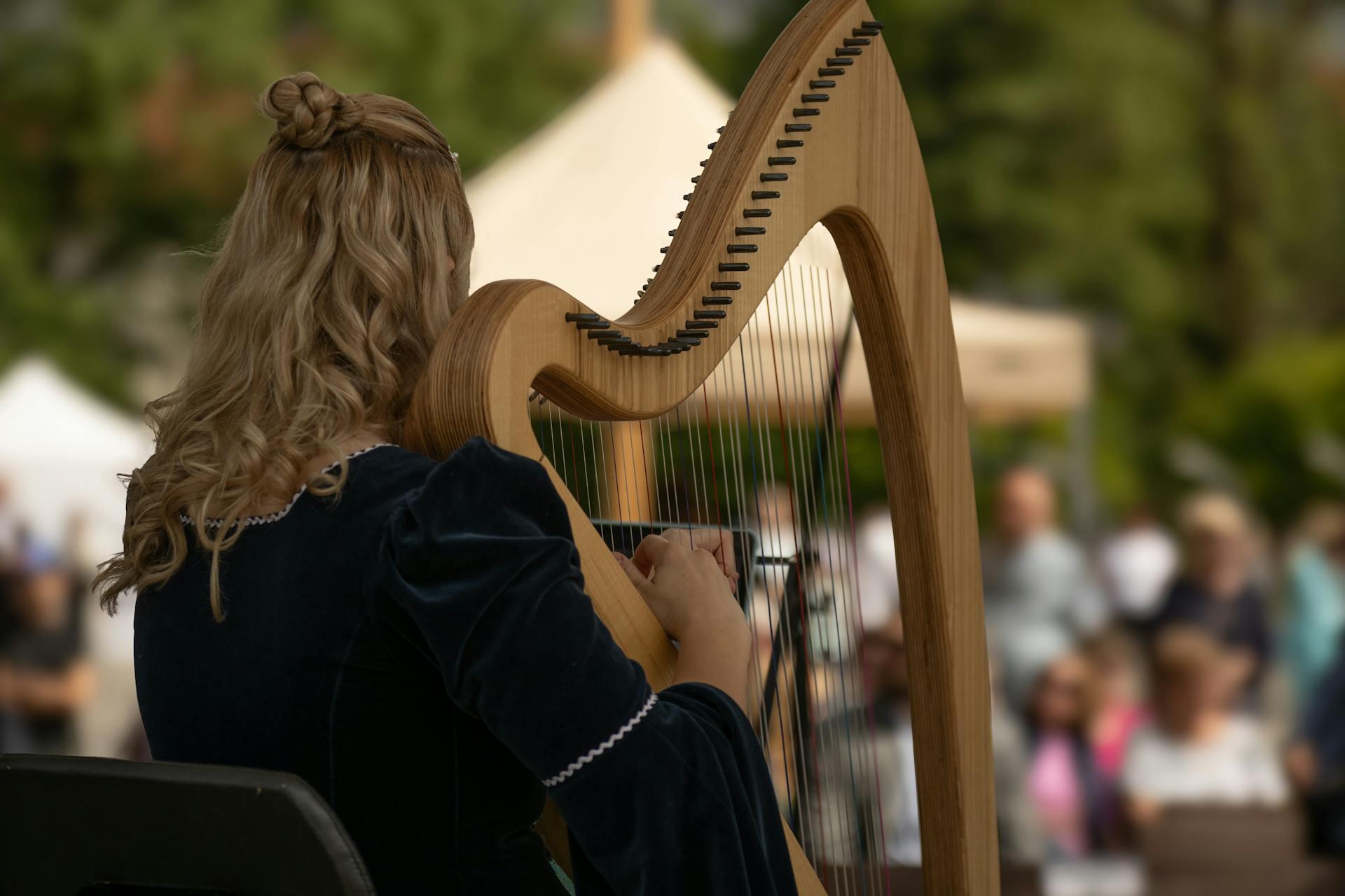 A Person Playing Harp.