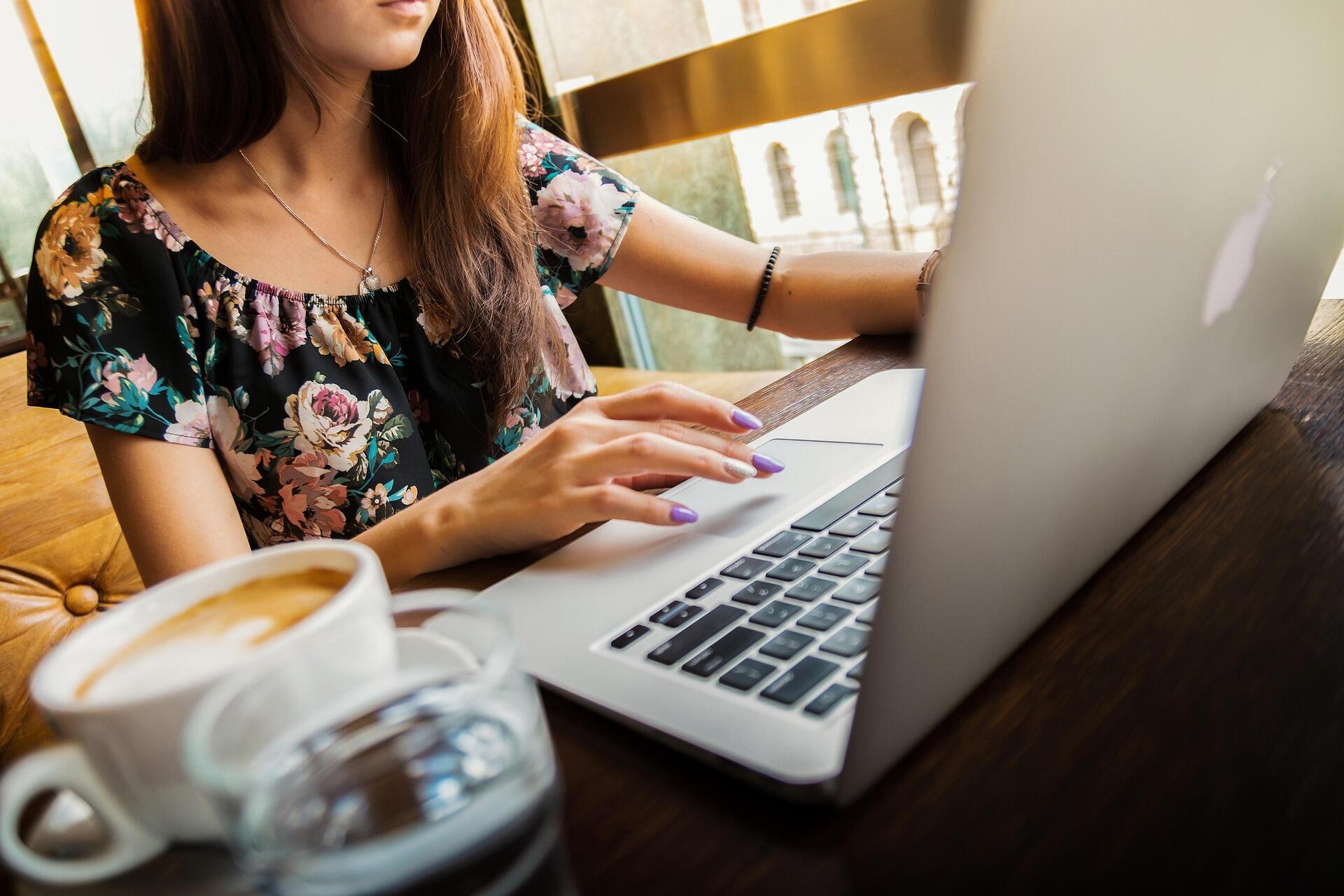 A woman working on a laptop