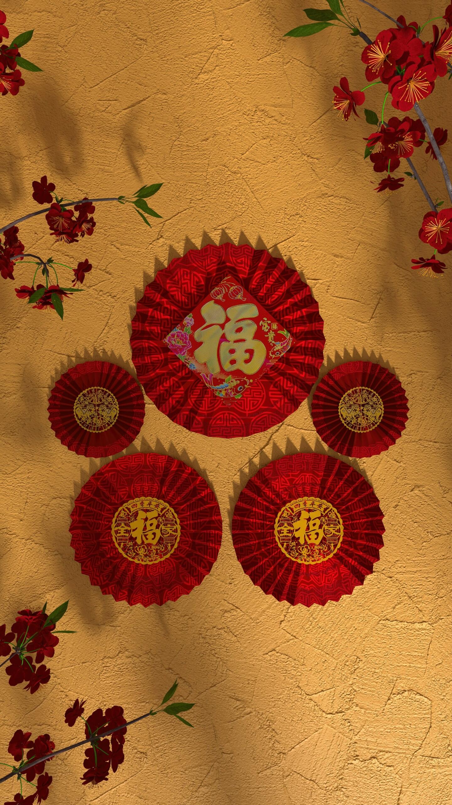 Red and gold Chinese decorations against a golden background.