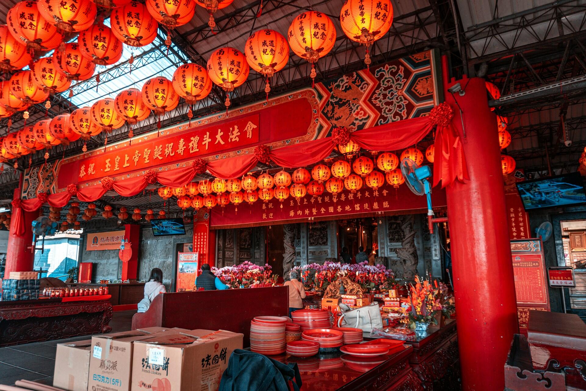 A market stall decorated in red and gold.