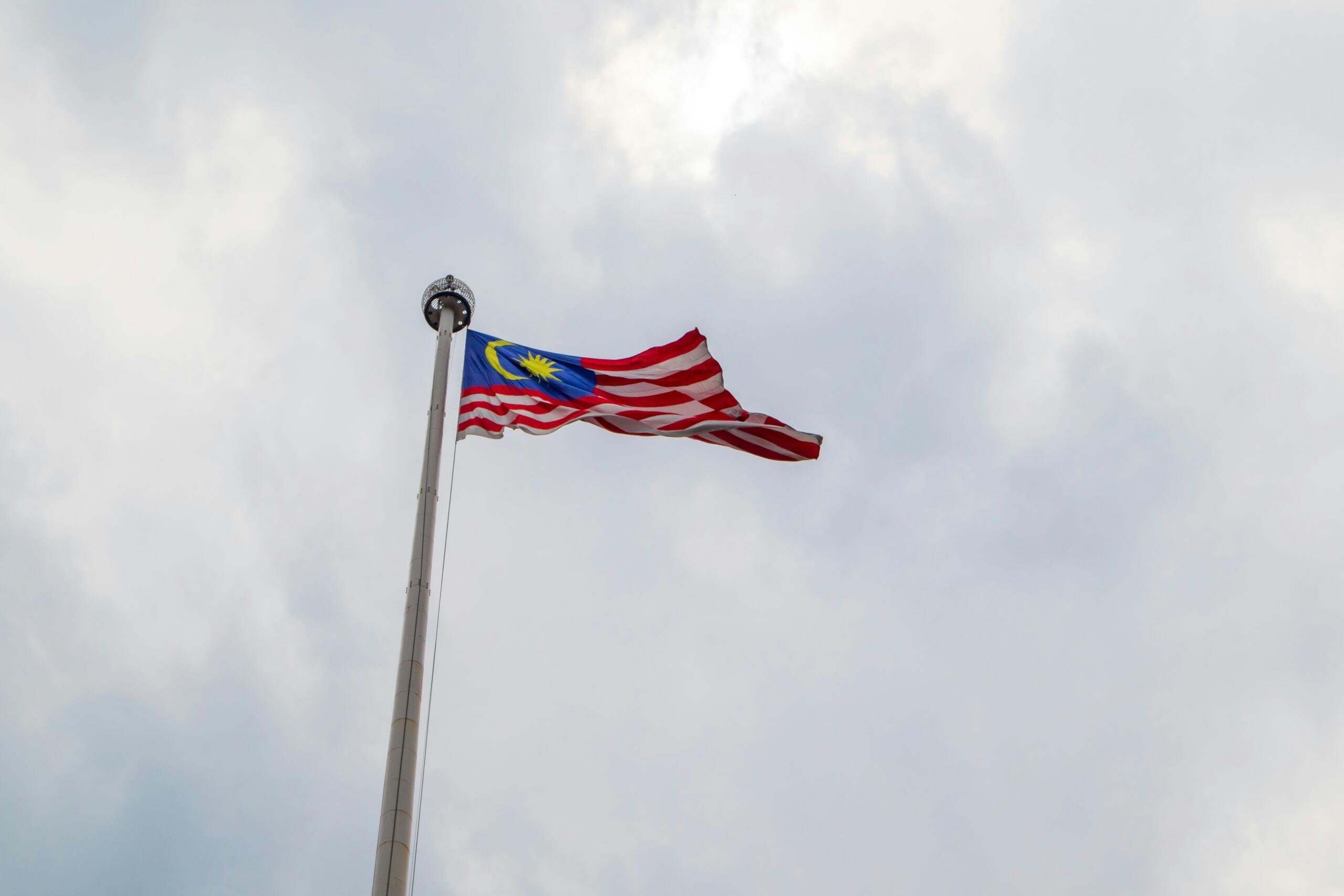 The flag of Malaysia in the sky.