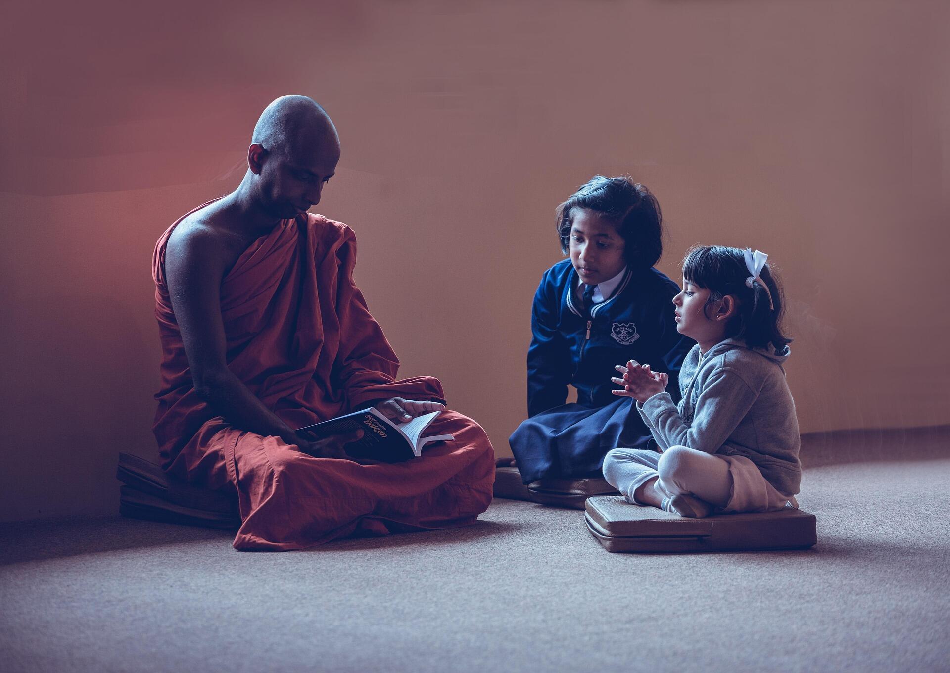 Teacher teaching his students