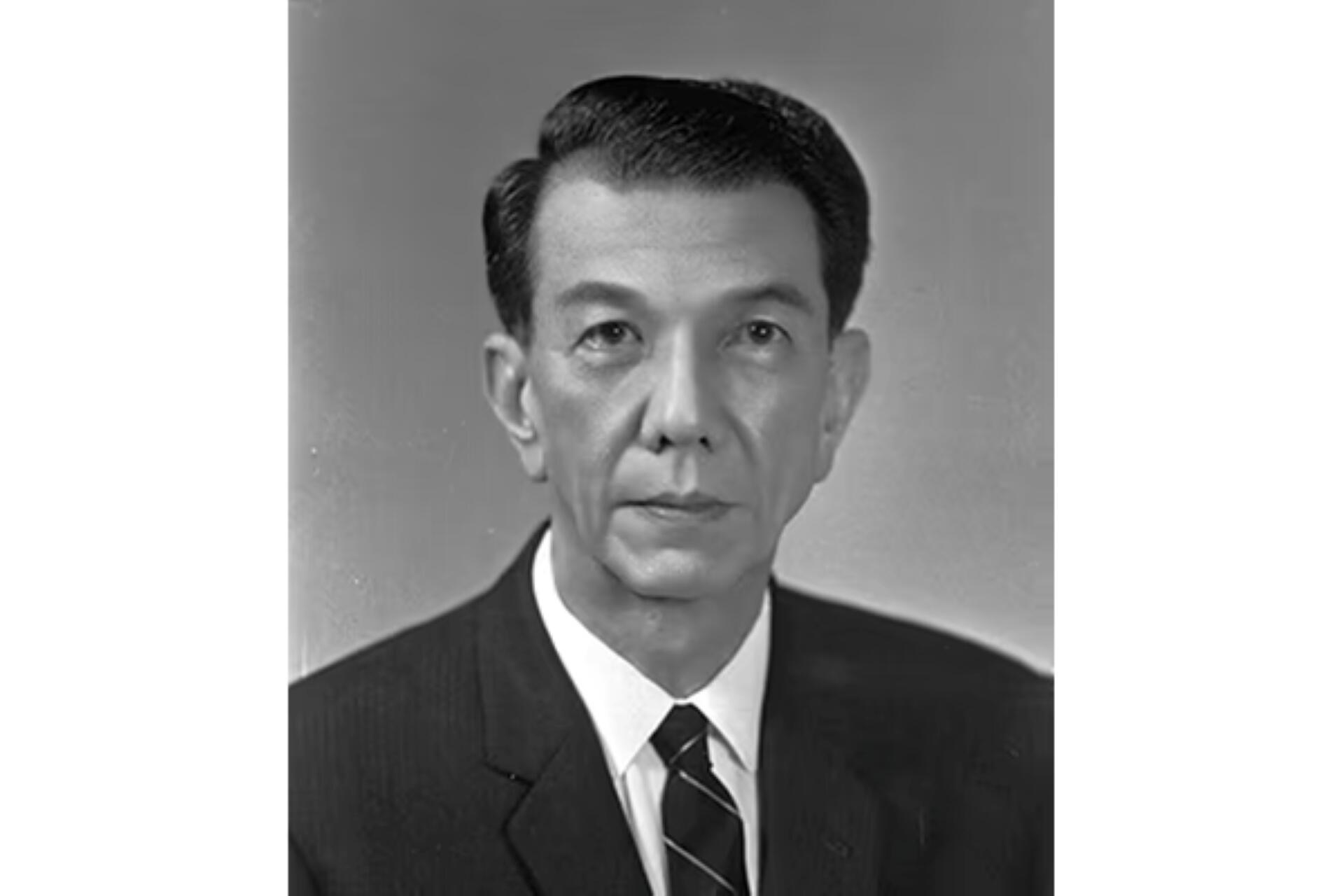 Black-and-white portrait of Benjamin Sheares in a suit and tie against a plain background.